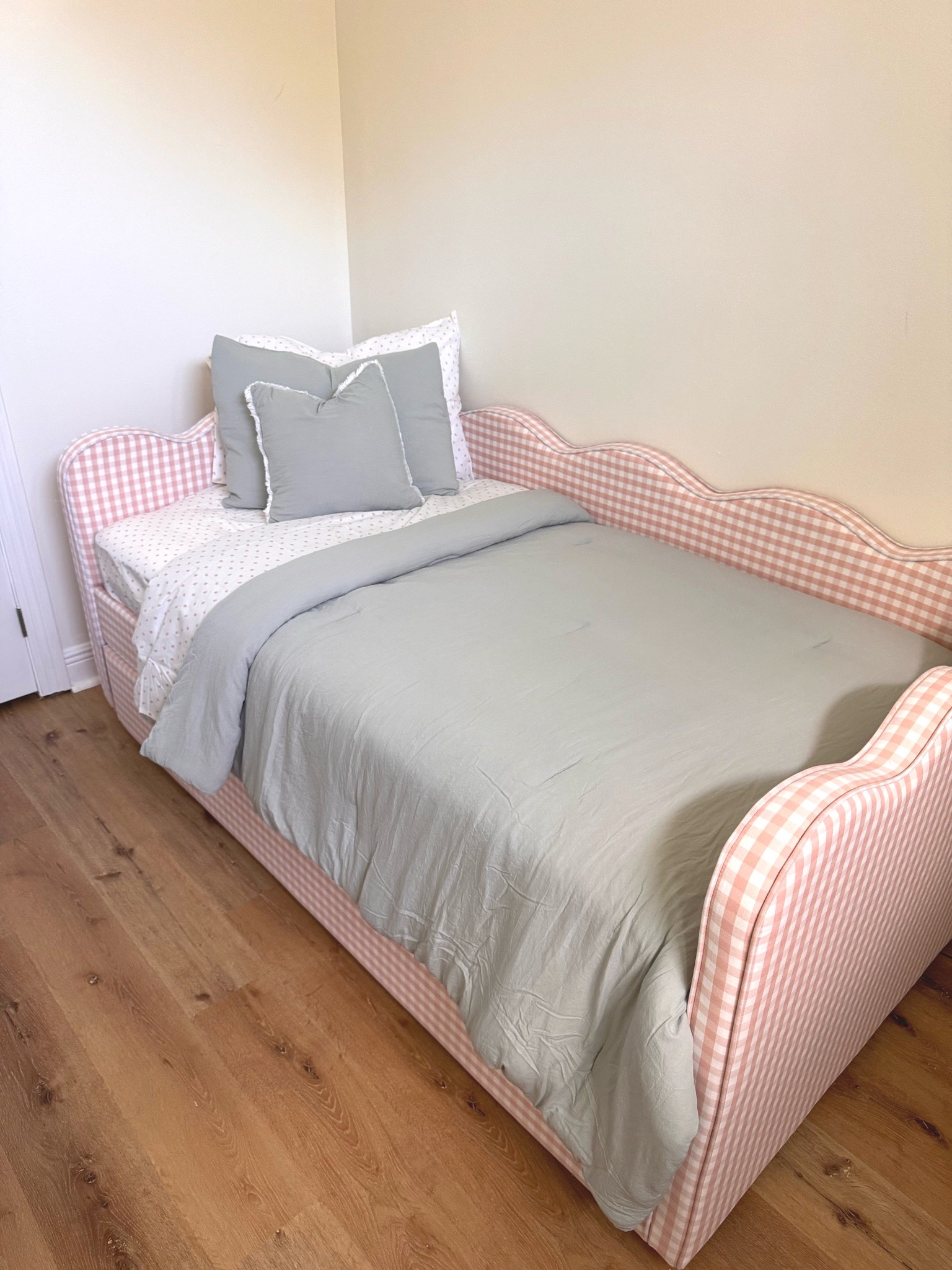 Sweetest little twin size trundle bed. The gingham fabric is too adorable. Perfect for a young girls room or nursery.

#LTKKids #LTKBaby #LTKHome