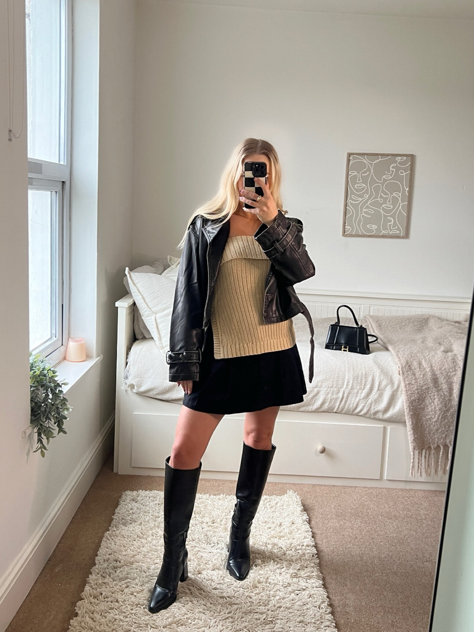 outfit of the night 🖤

&otherstories bandeau knit top, H&M pleated mini skirt, Stradivarius knee high boots & cropped leather jacket 

#LTKparties #LTKsalealert #LTKshoecrush