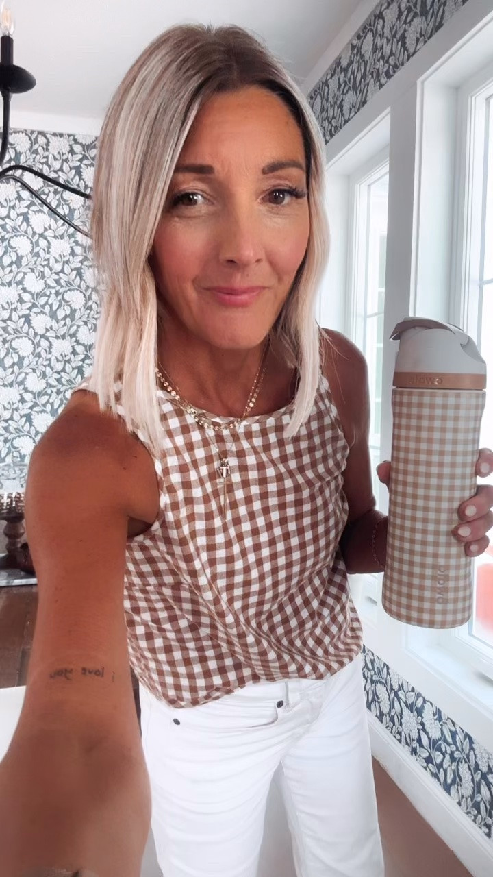OOTD !!! This checked cup is one of my favorites ever it’s spill proof and the little handle makes it great to carry with you everywhere. This top comes in a set or you can purchase separate ￼. I also have it in black-and-white check,￼ true to size several color ways. My cross charm & chain is 20% off with my code “jo” plus free shipping in the US. ! I will link everything here for you.!

#LTKdayinmylife #LTKootd #LTKBeauty