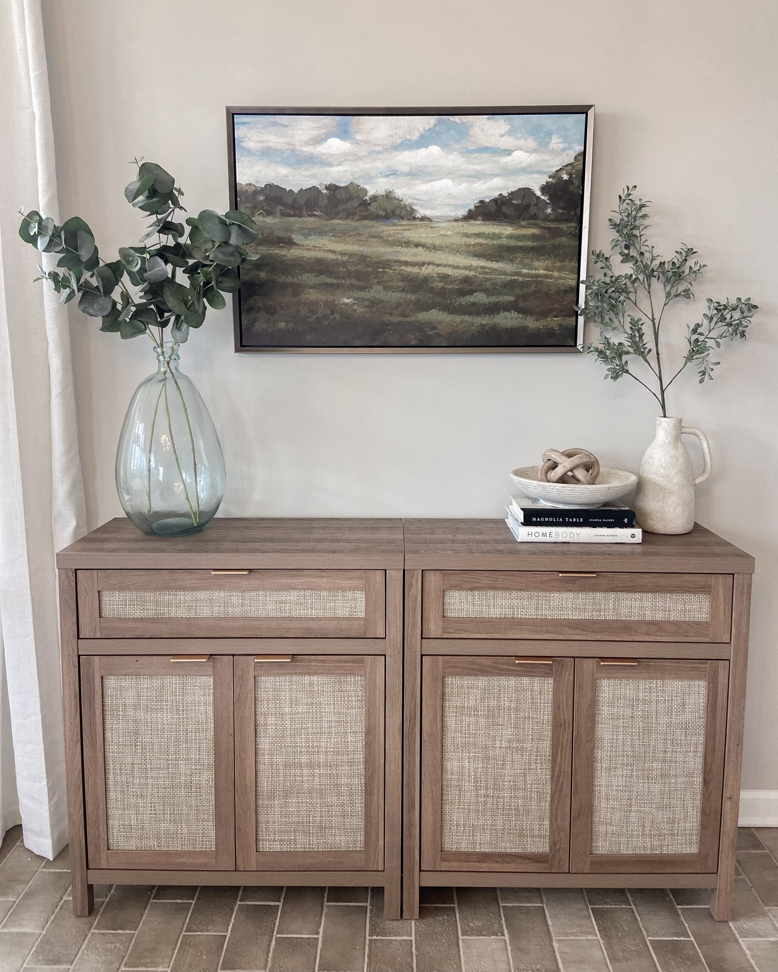 Wood and cane sideboard from Amazon. Kitchen Dining Nook. Dining Room. Transitional Decor. Sideboard Styling.
The bowl, wooden knot, vase, and stem on right are from Hobby Lobby.

#LTKfindsunder50 #LTKhome