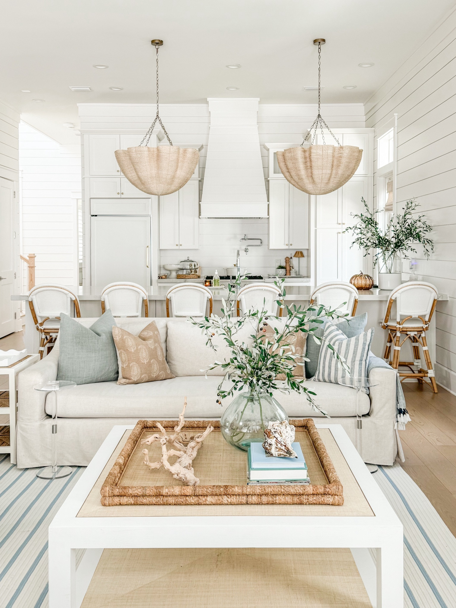 *Many of these items are currently on sale* Our living room and kitchen decorated for fall! Includes our linen sofas, striped rug, paisley throw pillows, faux olive stems, raffia coffee table, rosemary candle, brown glass pumpkins, acrylic side tables and more!
.
#ltkhome #ltkseasonal #ltkvideo #ltksalealert #ltkstyletip #ltkfindsunder50 #ltkfindsunder100 coastal fall decor, blue and brown fall decorating ideas 

#LTKSaleAlert #LTKHome #LTKSeasonal