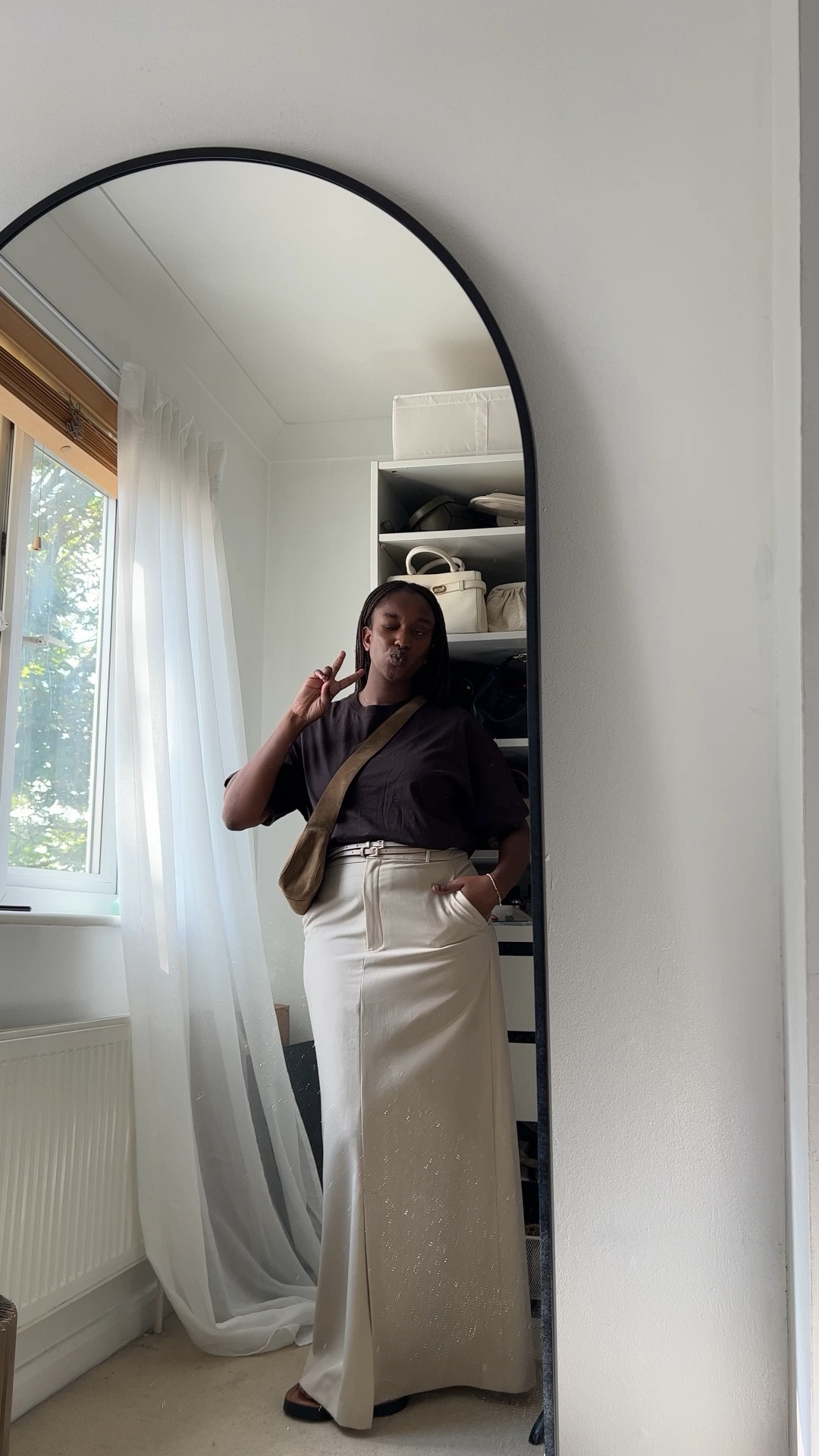 Styling my favourite mango maxi skirt with an H&M oversized boxy T-shirt white platform sandals from Marks and Spencer’s and a brown leather suede crossbody bag from Flattered! Loving brown tones for fall 🍁🍂 #maxiskirt #maxiskirtoutfit 

#LTKSeasonal #LTKmidsize #LTKstyletip