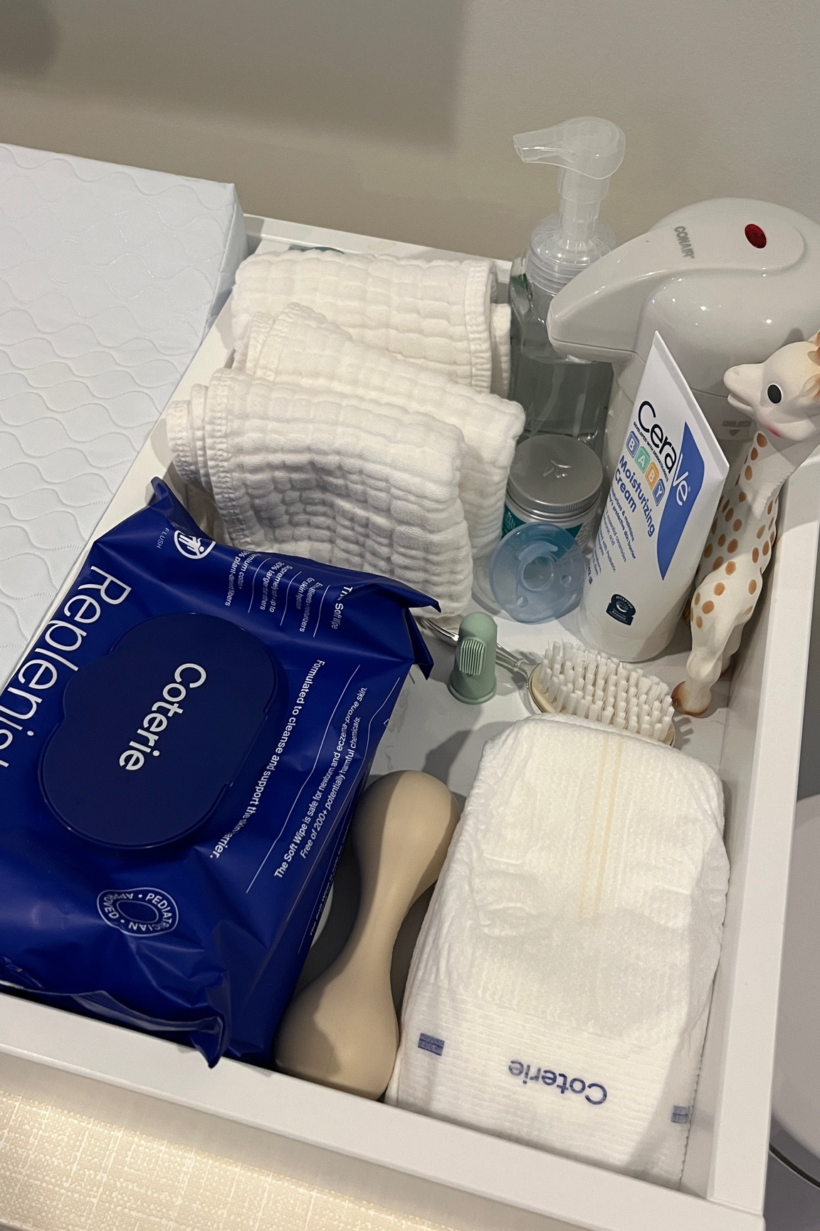 Our very real changing table with items that we have added and use daily with a 2-month-old

#LTKBaby