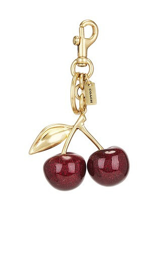 Coach Resin Cherry Bag Charm in Red. | Revolve Clothing (Global)