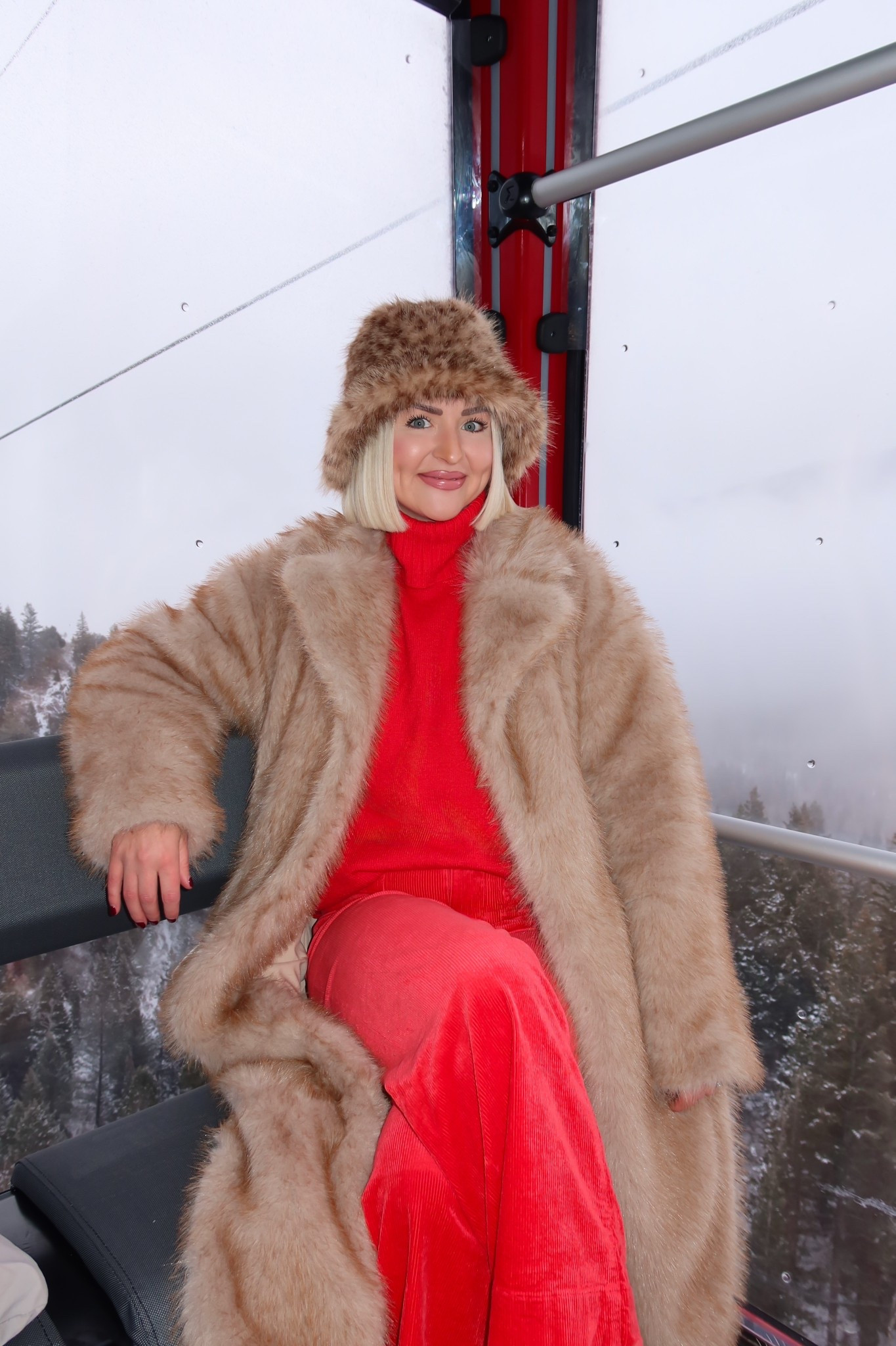 Park city winter outfit / Christmas red sweater / tan faux fur jacket / fur animal print bucket hat 

#LTKTravel #LTKHoliday #LTKPetite