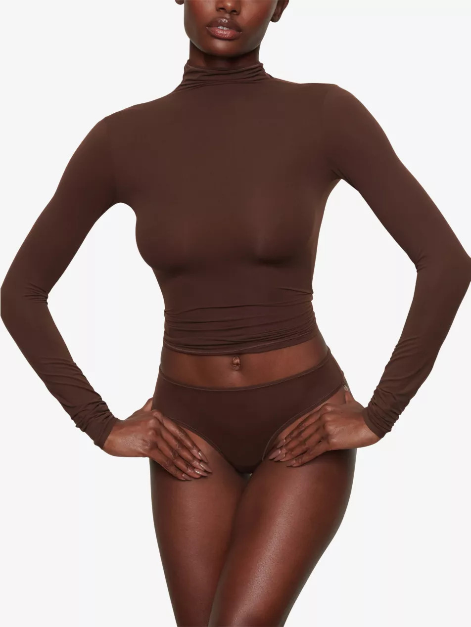 Fits Everybody turtleneck stretch-woven top | Selfridges