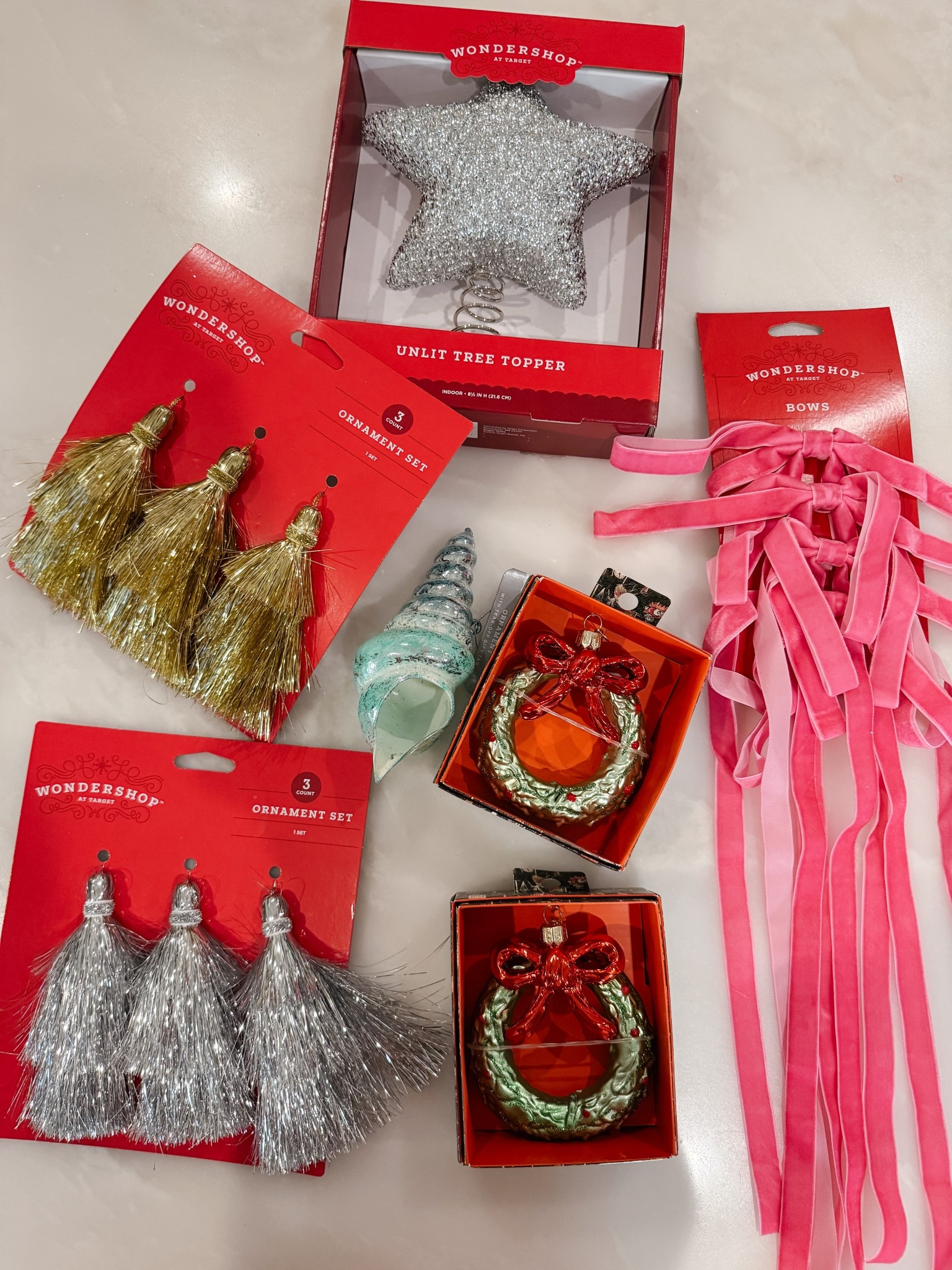 A recent Target order… here’s the tinsel tassels — pack of 3 for $5! I also love this pack of bows ($6) that I added to Oli’s tree! The star I added to Oli’s tree this year too  

#LTKHoliday #LTKSeasonal #LTKGiftGuide