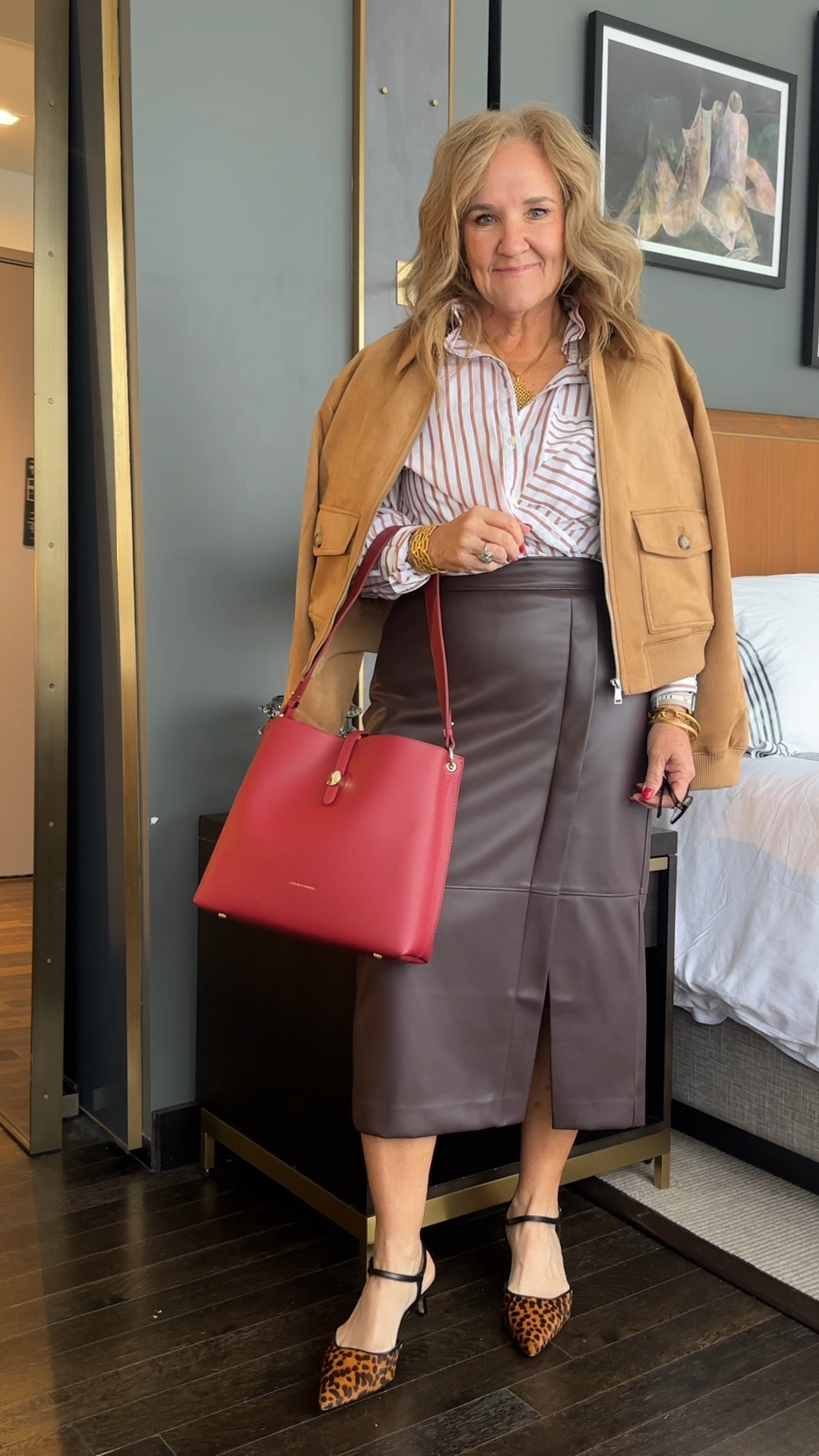 #ltkcon day 2. This is what you picked! This faux leather skirt is beautiful. Wearing a size 10 petite 
Blouse size medium. Oversized. 
Bomber jacket size medium and I’d say it does run big. It’s a beautiful faux suede 

Wearing the Eby support bra. I’ve been hooked on the relief bra but this feels amazing too! No clasp in the back. Pull over your head. 15% off code NANETTEFS15

#LTKMidsize #LTKWorkwear #LTKFindsUnder100