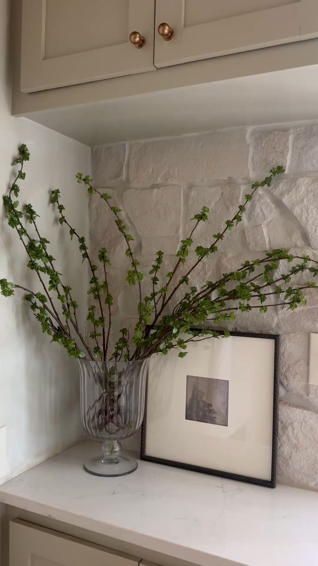 New year round stems in the laundry room. The artwork is old from hobby lobby. Vase is HomeGoods but I’ve found similar online! I used 8 stems here. The rock is Alamo sandstone random ledger panel from floor and decor.

#LTKHome #LTKSeasonal