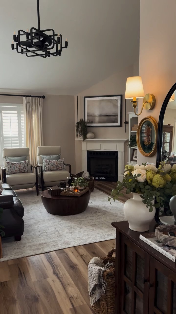 Not every love story looks the same…ours is gallery walls with meaning, florals in every corner, and lighting that makes everything feel like home.

#cozyvibes #cozyhome #cozyhomedecor #traditions #vintagemodern