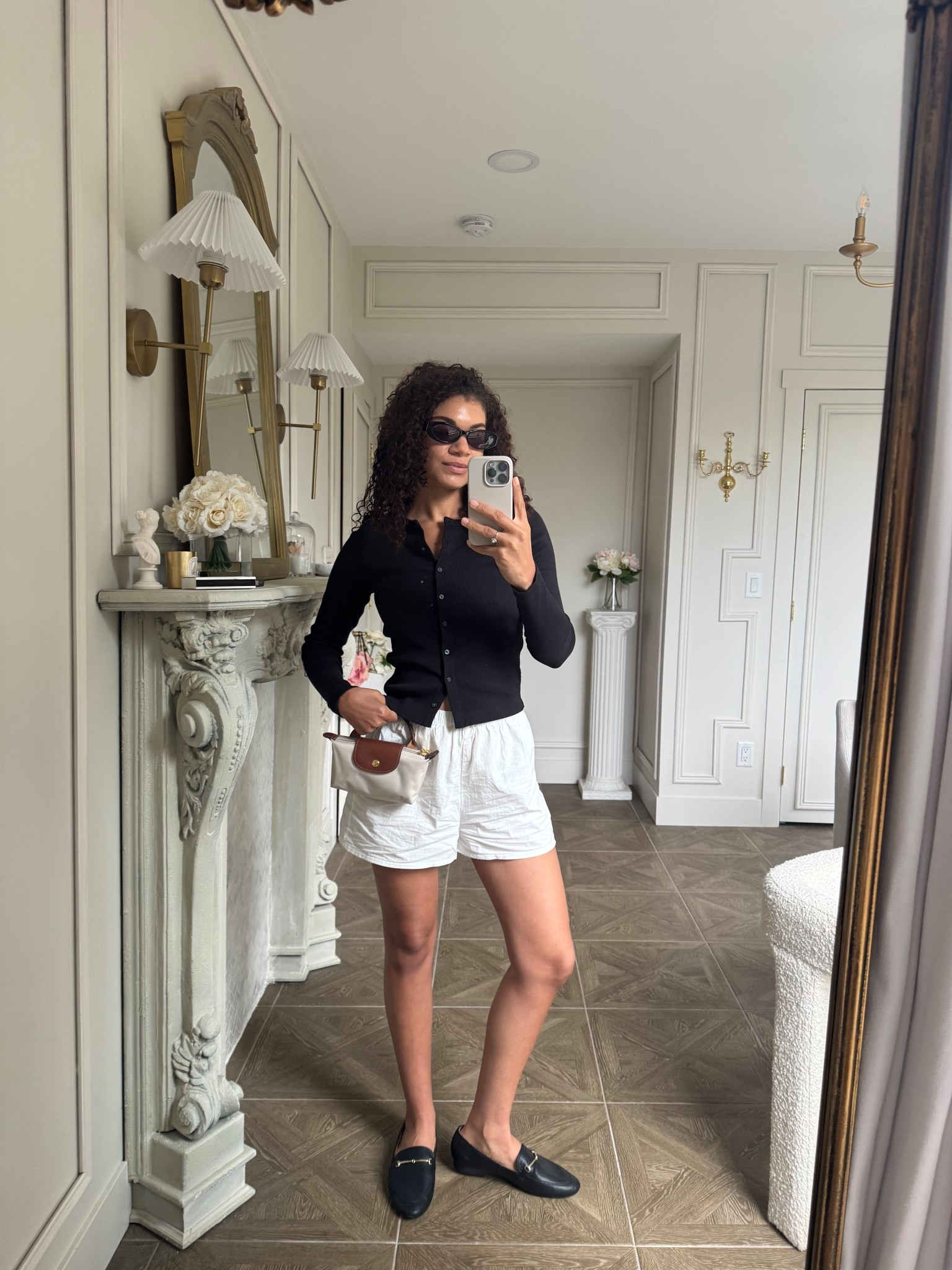 White shorts outfit with cardigan, loafers, sunglasses, and a mini bag 

#LTKootd