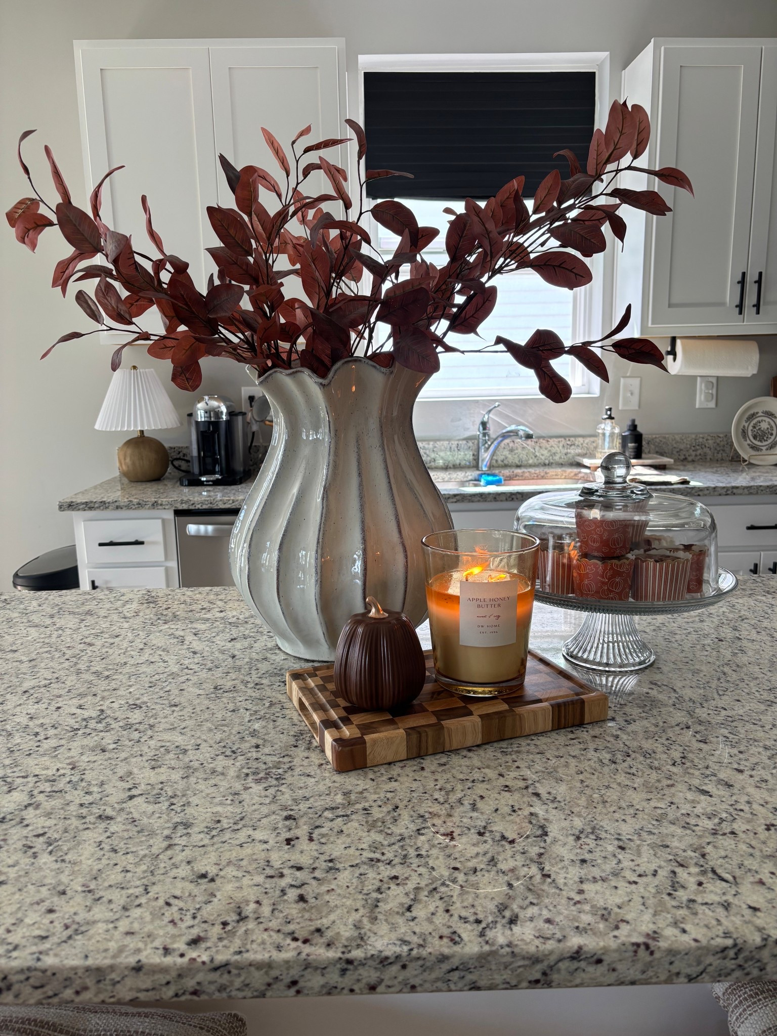 A touch of fall 🍂 The checkered cutting board is from Hobby Lobby and I thrifted the glass dome cake stand! 
#ltkautumn #ltkseasonal #ltkhome

#LTKHome #LTKSeasonal