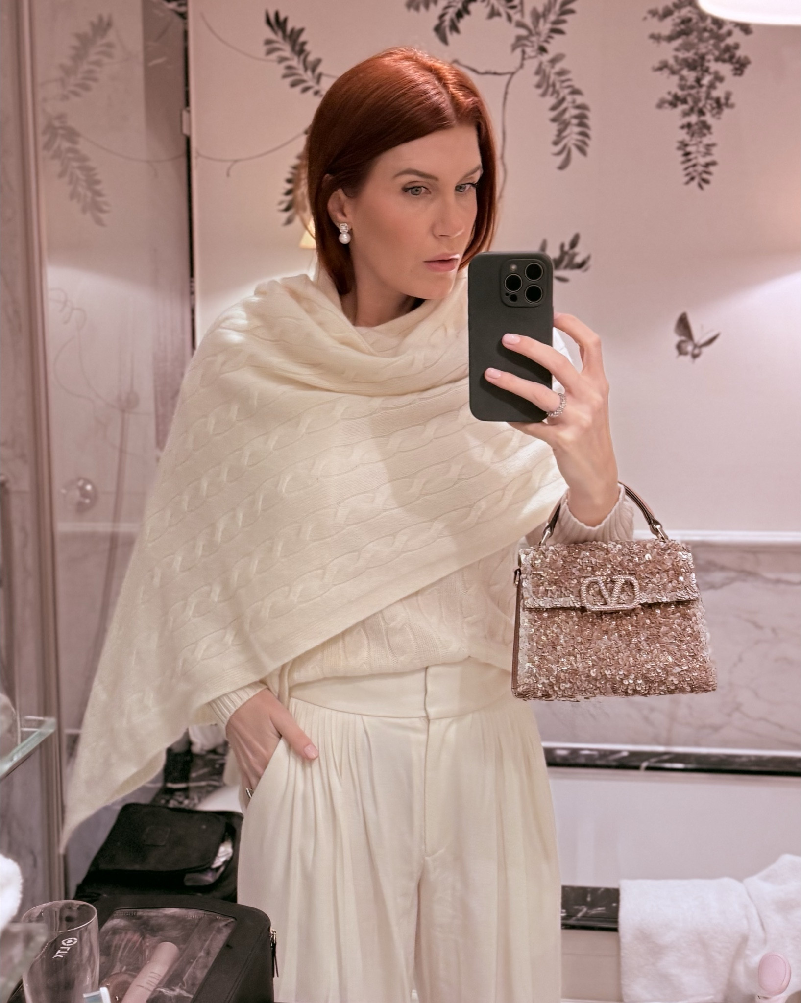 Headed out to dinner in London in this elegant look. I have mixed and matched these pieces for you quite a bit lately- they are all “wardrobe builders” - timeless investment pieces. 
I layered a cashmere cable knit crew neck under a wrap- also by Ralph Lauren. 

#LTKootd #LTKTravel #LTKWorkwear