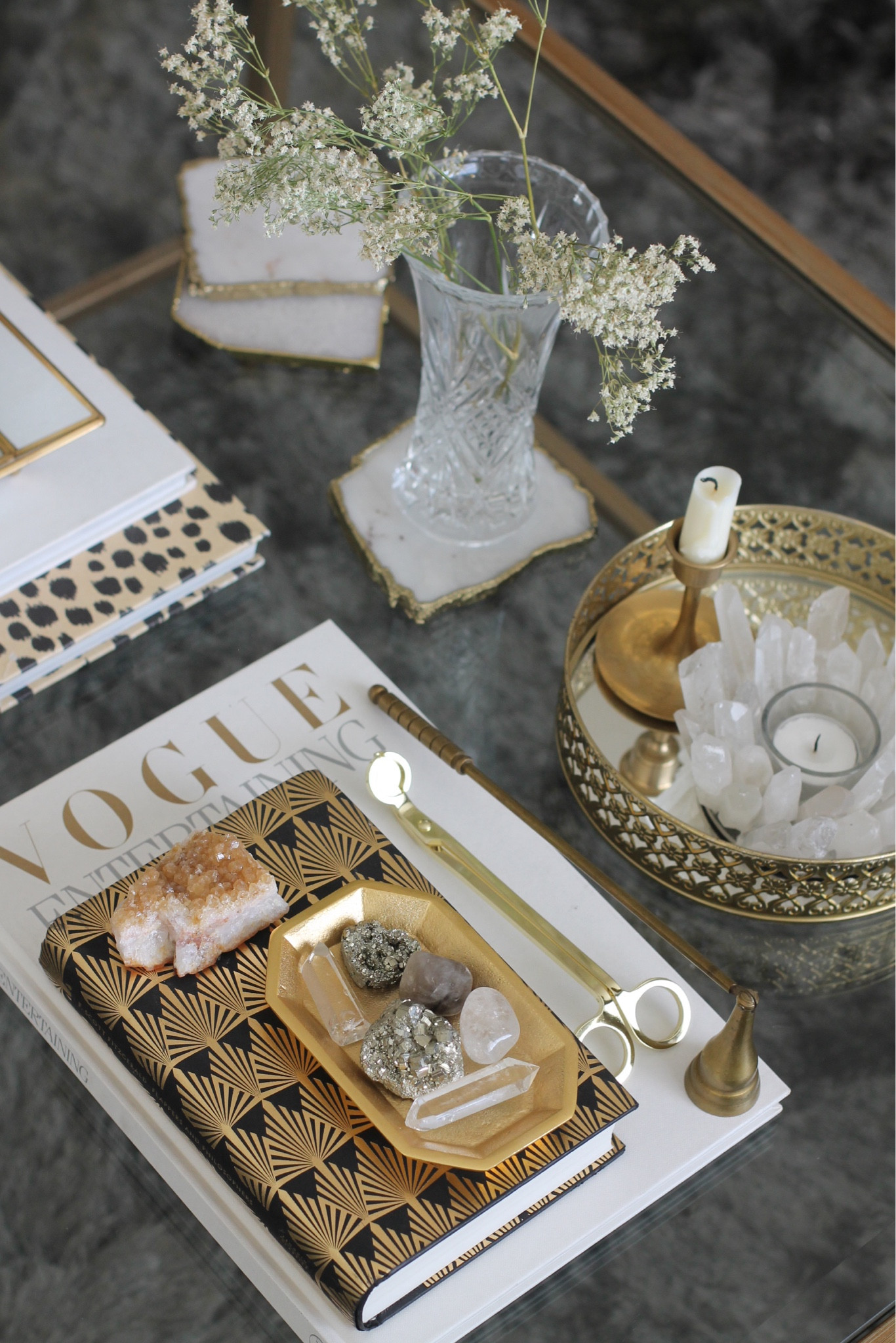 Living room decor
Glass Coffee table 
Books, candles, and crystals


#LTKHome #LTKFindsUnder100 #LTKFindsUnder50