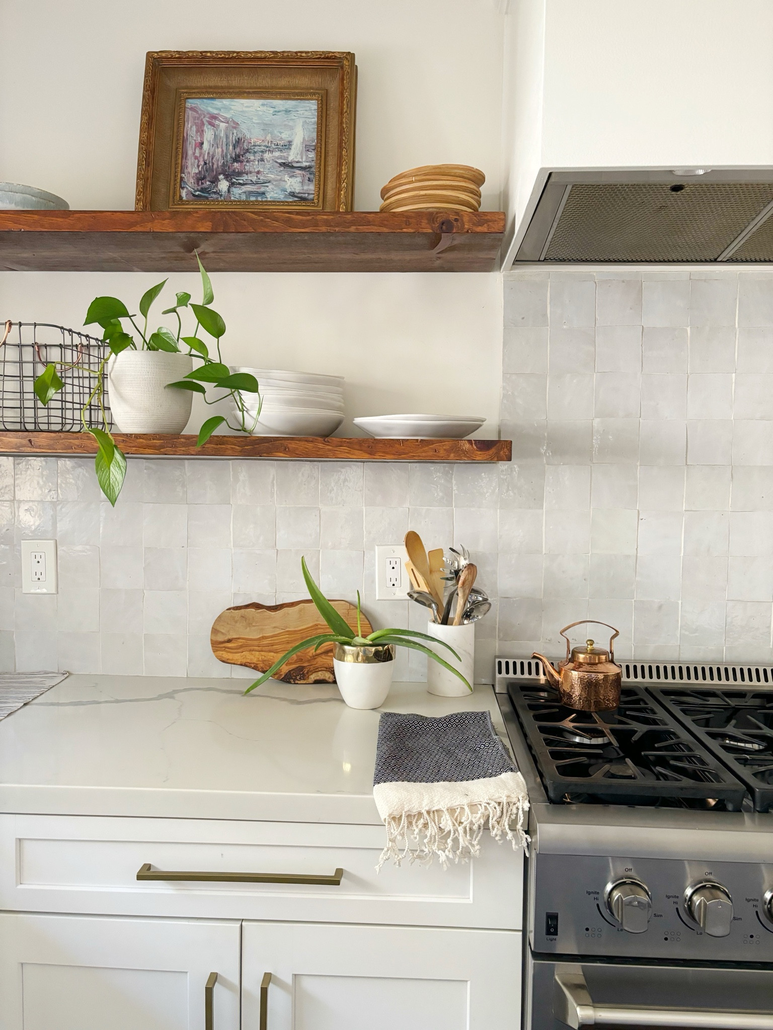 Let’s bring up a controversial issue- open shelving!  Do you love it or hate it?  I love mine but I have a few things that make it work- I have enough storage in my kitchen that I can keep it to decorative items.  Plastic stuff and kids water bottles are stored below in cupboards.  I have a housekeeper that dusts once a month because honestly, I’m not going to dust all these items regularly.  Here are some of my favorite decorative kitchen items.  

#LTKhome