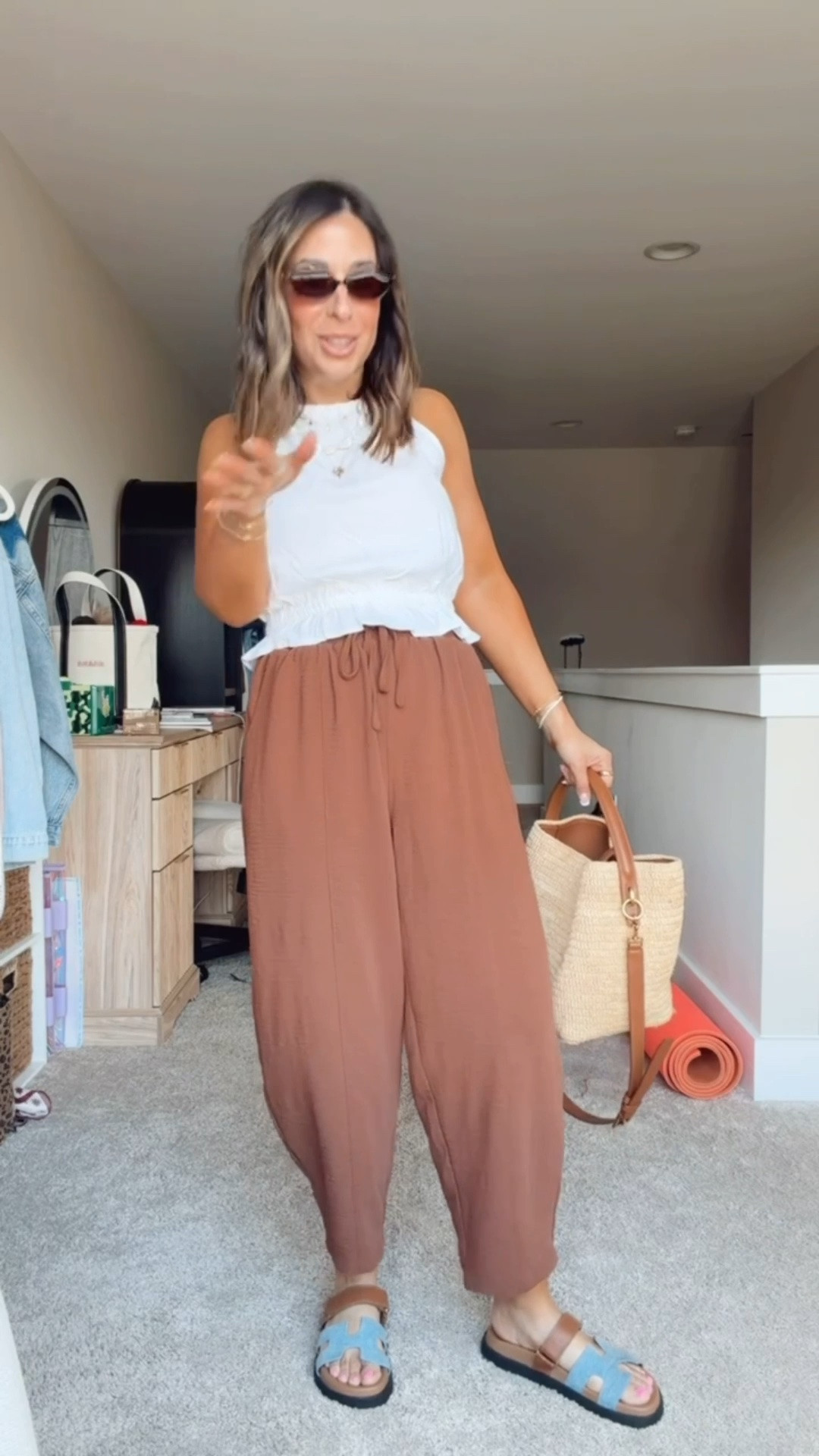 These pants are an absolute must have in all the colors. I have been loving them, sharing them and wearing them repeatedly for years. I love the way they fit my 5’ frame, and the way to flow with this peplum top is absolutely adorable. This look is an immediate 10/10!
Summer outfit inspo, how to wear brown ankle pants, brown, white and blue summer look

#LTKMidsize #LTKSeasonal
