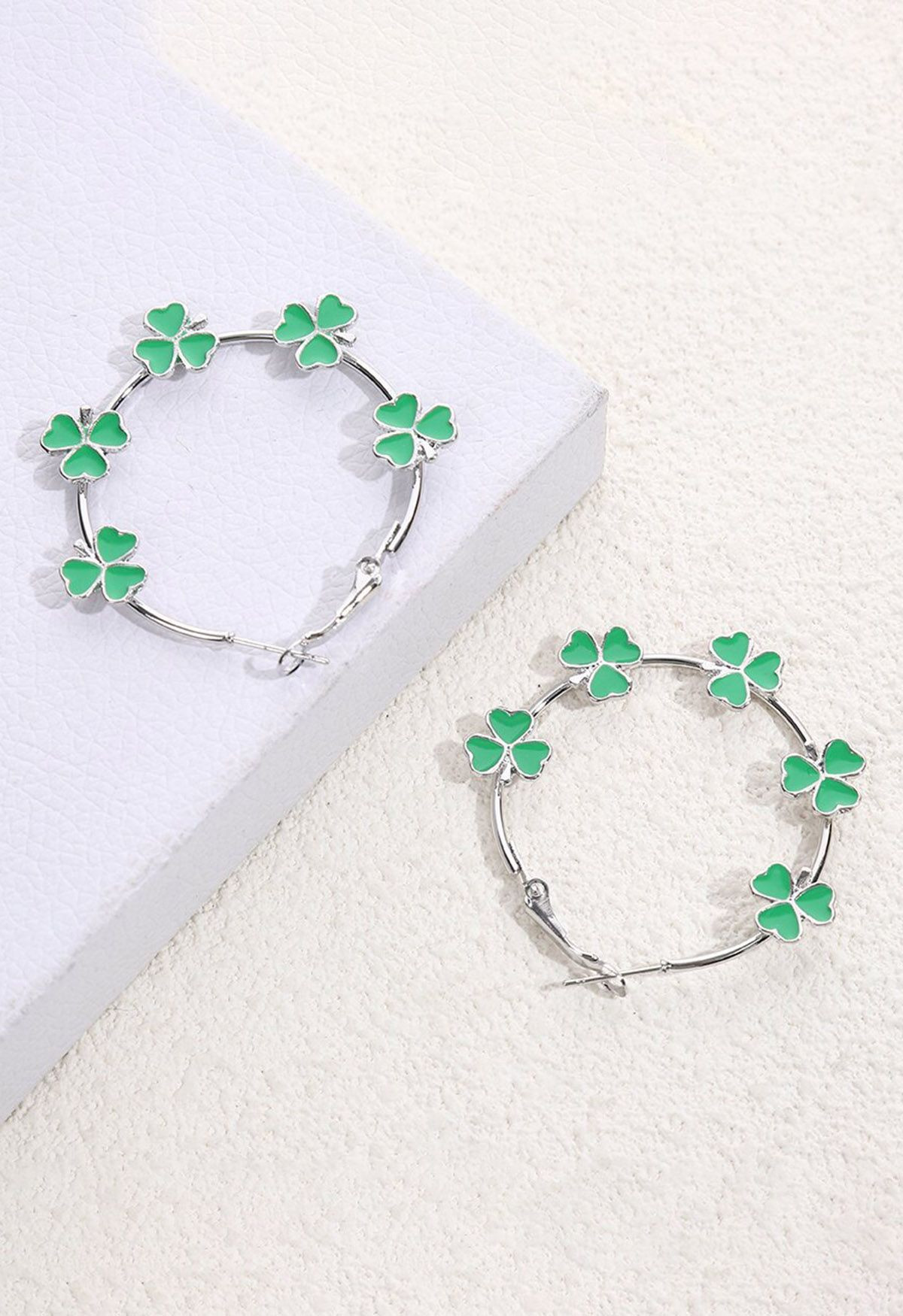 Lucky Clover Oil Spill Hoop Earrings in Silver | Chicwish