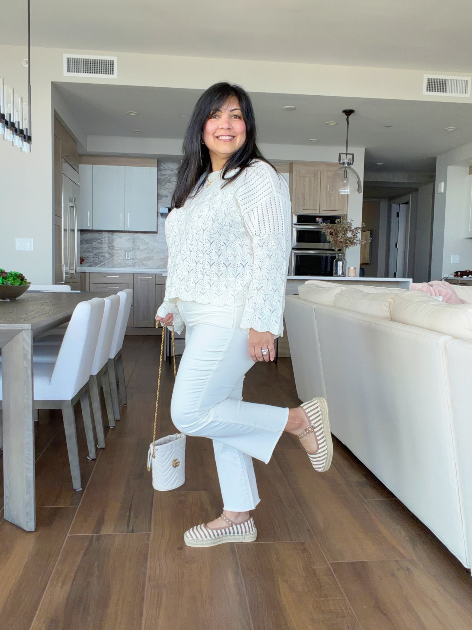 It’s officially spring and this monochromatic look is perfect for transitioning to warmer weather. This is my first time trying @NYDJ jeans and these mini bootcut ankle jeans are such a dream, especially for a midsize petite frame with lots of curves! If you’re shaped anything like me, you know it’s tough to find off-white or ecru jeans that are comfortable, stretchy, flattering and not see-through. These are a winner on all fronts and they come in petite sizes too! This style and silhouette literally sculpts your curves and there’s a slimming panel across the front that does such a good job holding you in too. And this Pointelle sweater is so pretty! Love  all of the sweet feminine details. It’s really light and airy so I know it’ll feel good in the warmer weather and the scallop edges and flared sleeves add the cutest touch! If you struggle with finding well-fitting jeans for your size and frame, try these! They’re really good! And if you’ve been around here for a while, you know I’m pretty picky about jeans and very selective about styles and brands I recommend!

NYDJ Pointelle sweater size large and jeans size 12 Petite. Anthropologie striped espadrilles. Gucci bucket bag. Kendra Scott necklace. 

#LTKMidsize #LTKPetite #LTKootd