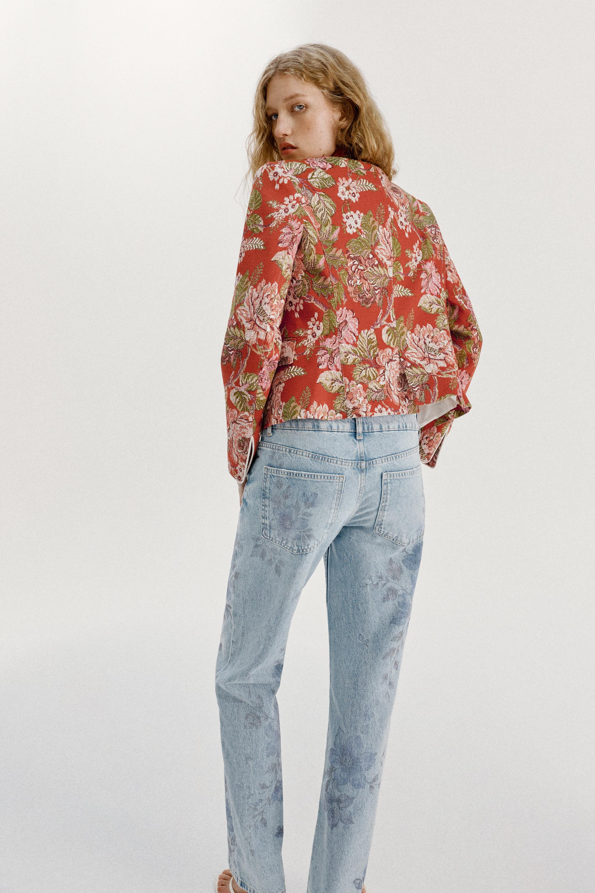 High-neck long-sleeve blazer with shoulder pads. Features front flap pockets and a front button c... | Zara US