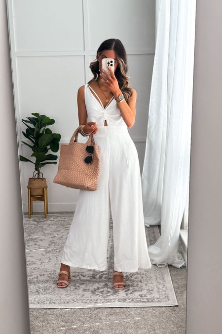 This Amazon jumpsuit looks and feels high end. The white is double lined and nice and breathable. Dress up or down. Wearing a size small. Fits true to size. 