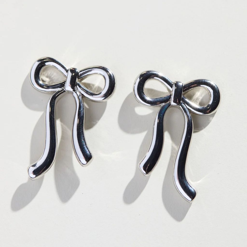 Silver Vintage Bow Studs | Nickel and Suede