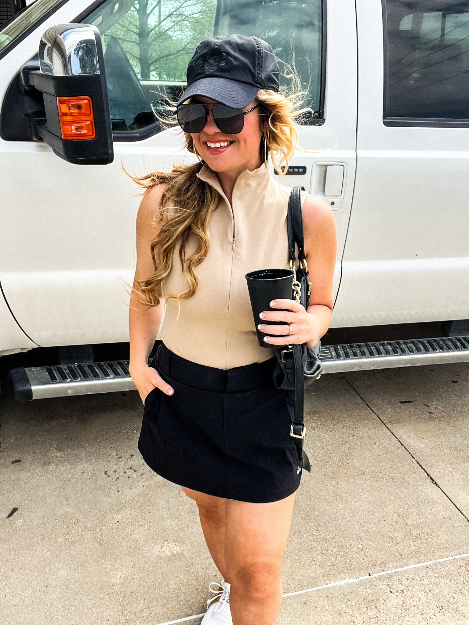 Golf outfit ideas
The best golf skirt
It’s so flattering! Pleated and cinched waist. No pinching! So good! 

Top from express. 