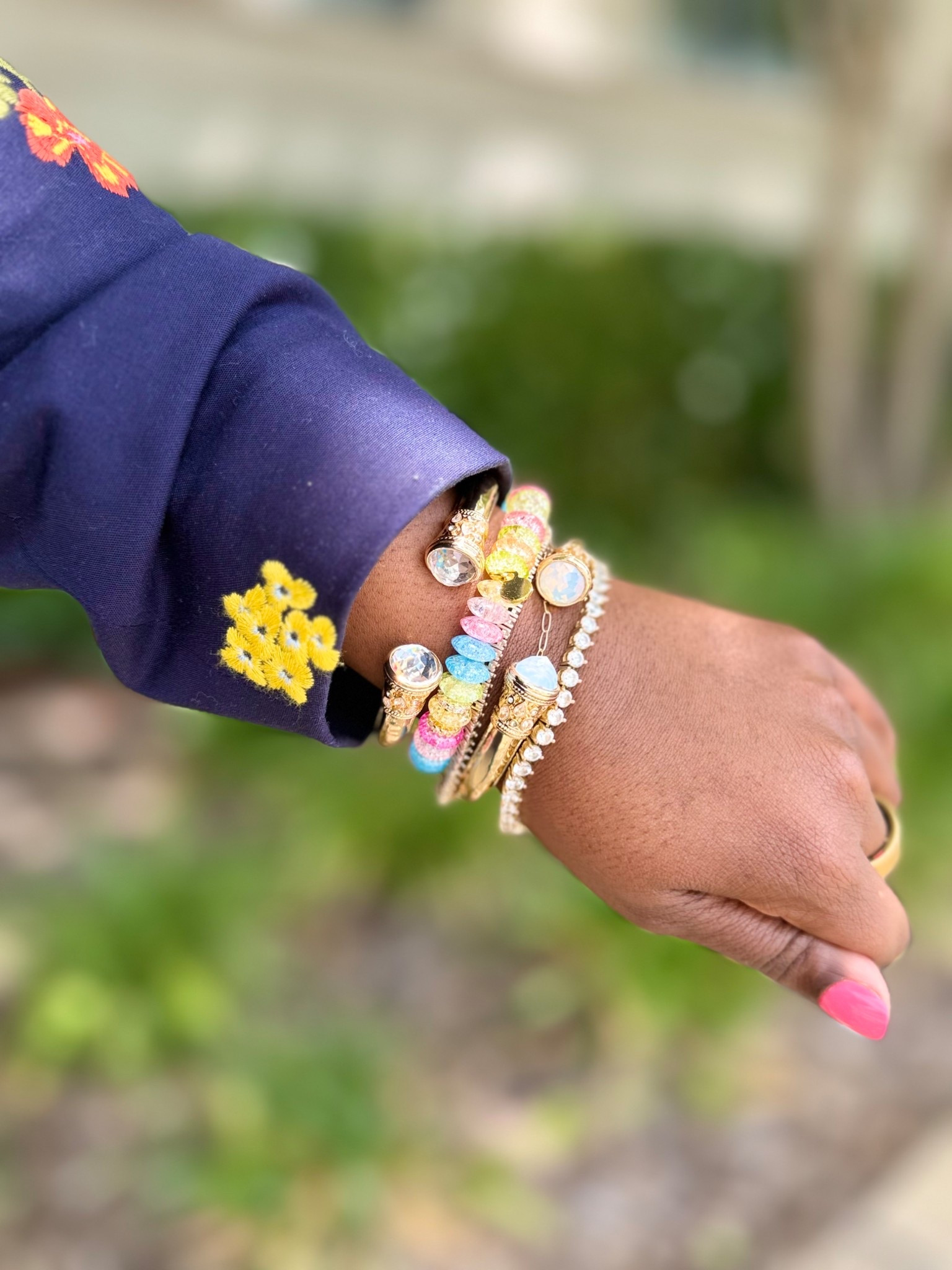 My bracelet stack of the day! I have quickly fallen in love with these gold cuff bracelets from @thewillowtree 🫰🏾 and how fun is the colorful beaded stretch budhagirl bracelet to add the perfect amount of color! 

#LTKootd #LTKWorkwear #LTKgrwm