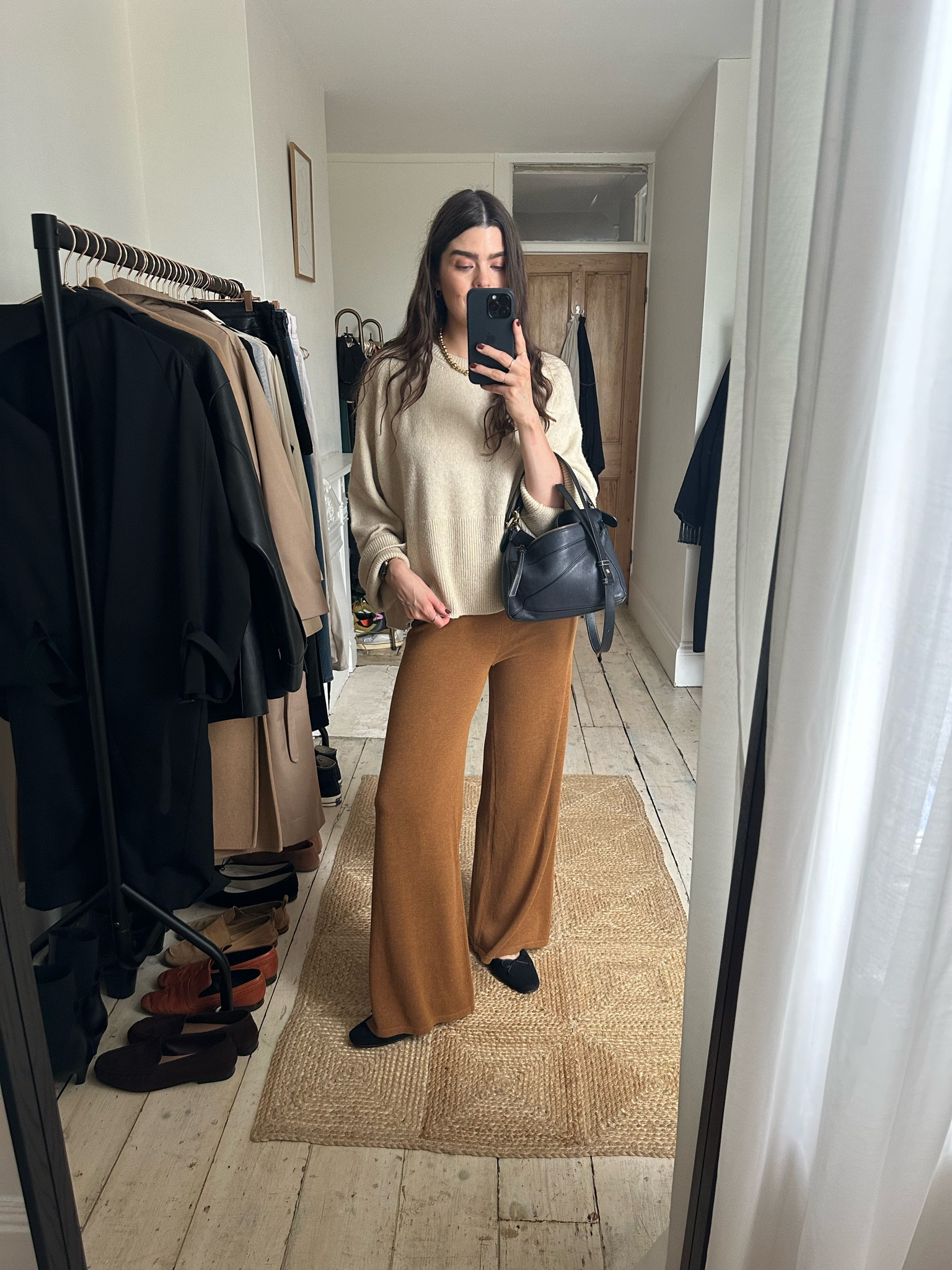 An autumn outfit that’s great for working from home in - the jewellery plays a BIG part in dressing it up. 
- Toteme preloved jumper (there’s a good dupe from ARKET - I’d wear a M) 
- MANGO Knitted Trousers (I wear them in a M) 
- Loewe puzzle bag (it’s the small size in midnight navy) 
- Flattered Mules (if you’re between sizes I’d go for the size up) 
- Lie Studios Necklace 

#LTKeurope #LTKstyletip #LTKSeasonal