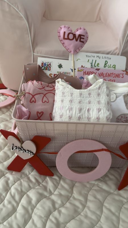 Valentine’s Day basket for my 6 month old baby, Valentine’s Day gifts for kids, Valentine’s Day idea, xo garland, heart outfit for baby, Valentine’s Day books, donut pajamas 

#LTKbaby #LTKkids #LTKGiftGuide