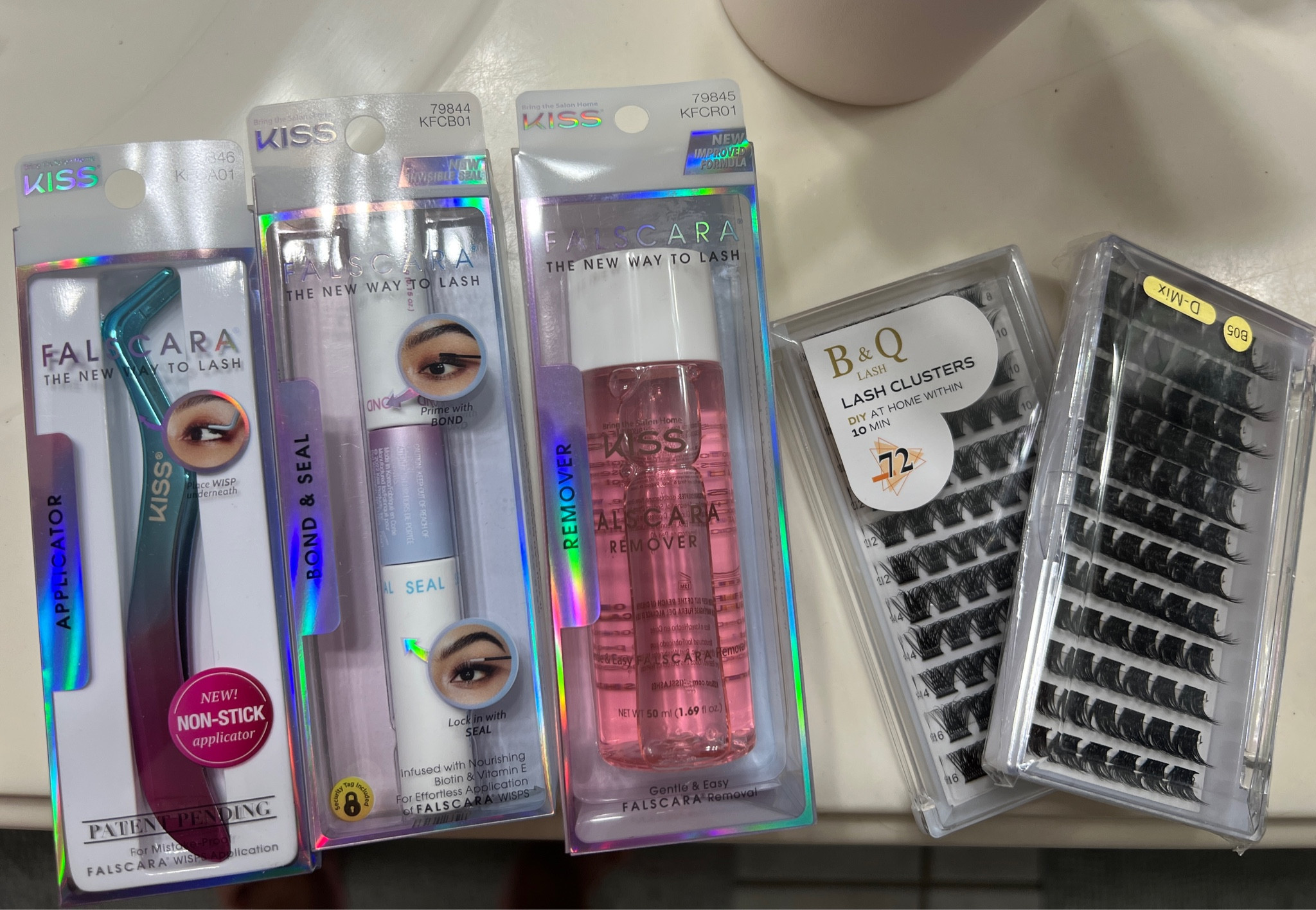 Everything I use for DIY at home lash extensions! 
- falscara tool 
I didn’t use this last time I did extensions, I just used tweezers and WOW these make such a difference. Regular tweezers kind of destroy the extensions if you aren’t super careful. Sometimes mine would rip in half, but those were also the kiss ones and I’m not using those anymore. 
- falscara bond and seal : TikTok will tell you it’s not that good, but personally I love it. It lasts 4-6 days for me, it’s easy to apply, and you can buy it anywhere if you run out. 
- falscara lash remover. : you’ll definitely need a remover of some sort to get all the glue off when you’re ready to remove. I also use a neutrogena one that I’ll link that I think actually works better. The falscara is small enough to keep in your makeup bag if that’s something you’d like though. 
- I’m in love with these specific lash clusters!! The kids ones were just too thin and didn’t seem to make that much of a difference. These have a thicker band (not too thick) so they last longer IMO. My lash map is 16,16,14,12,12 🫶🏼 

#makeup #lashes #diylashes #lashextensions #diylashextensions 

#LTKxPrimeDay #LTKbeauty #LTKsalealert