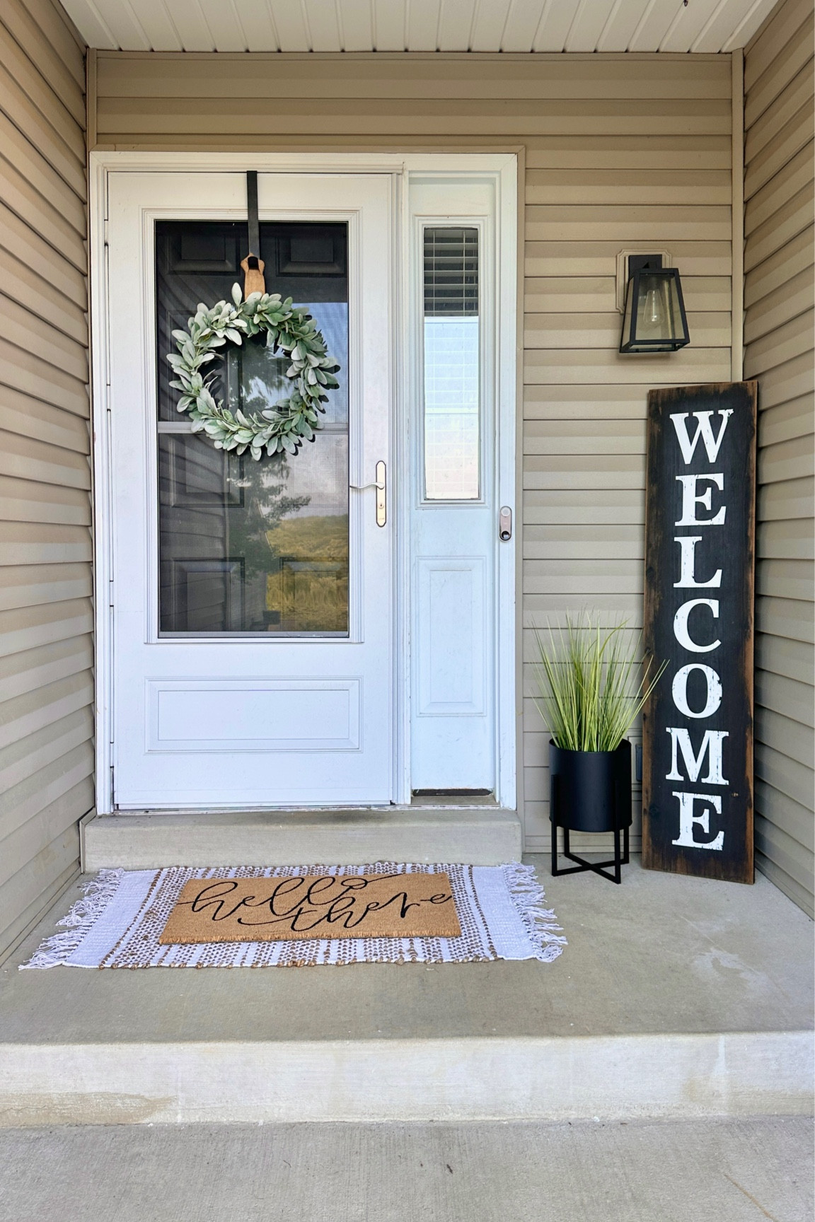 Mid-Summer Porch Refresh! I’m loving the layered rug / doormat decor trend so much, and always using fake plants because I don’t have a green thumb 😂

#LTKSeasonal #LTKhome #LTKFind