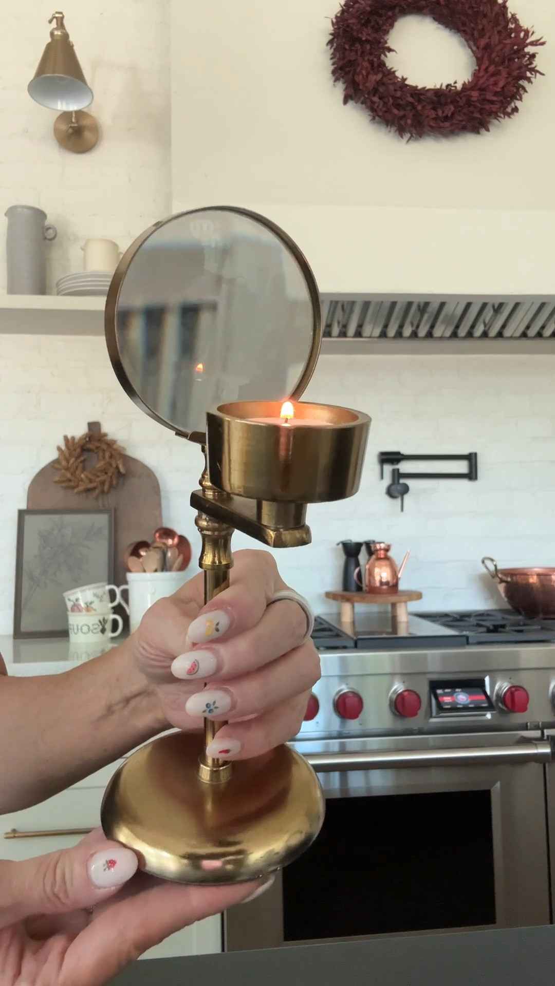 Brass tea light magnifying glass stand @elementsbyremedy

#LTKSeasonal #LTKHome