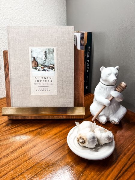 Kitchen favorites🫶 featuring this adorable little ceramic bear that hold honey & olive oil dipping tray🤌🏼 My favorite new price is this gorgeous $20 wooden and gold cookbook stand 👏🏼 and I’m linking up our favorite cookbooks too! Tons of great pizza cookbooks and this cookbook if you’re wondering what to cook up for delicious supers✨ 

#LTKfindsunder50 #LTKhome #LTKfamily