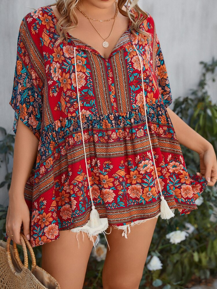 SHEIN VCAY Plus Floral Print Tassel Tie Neck Batwing Sleeve Peplum Blouse
       
              
... | SHEIN