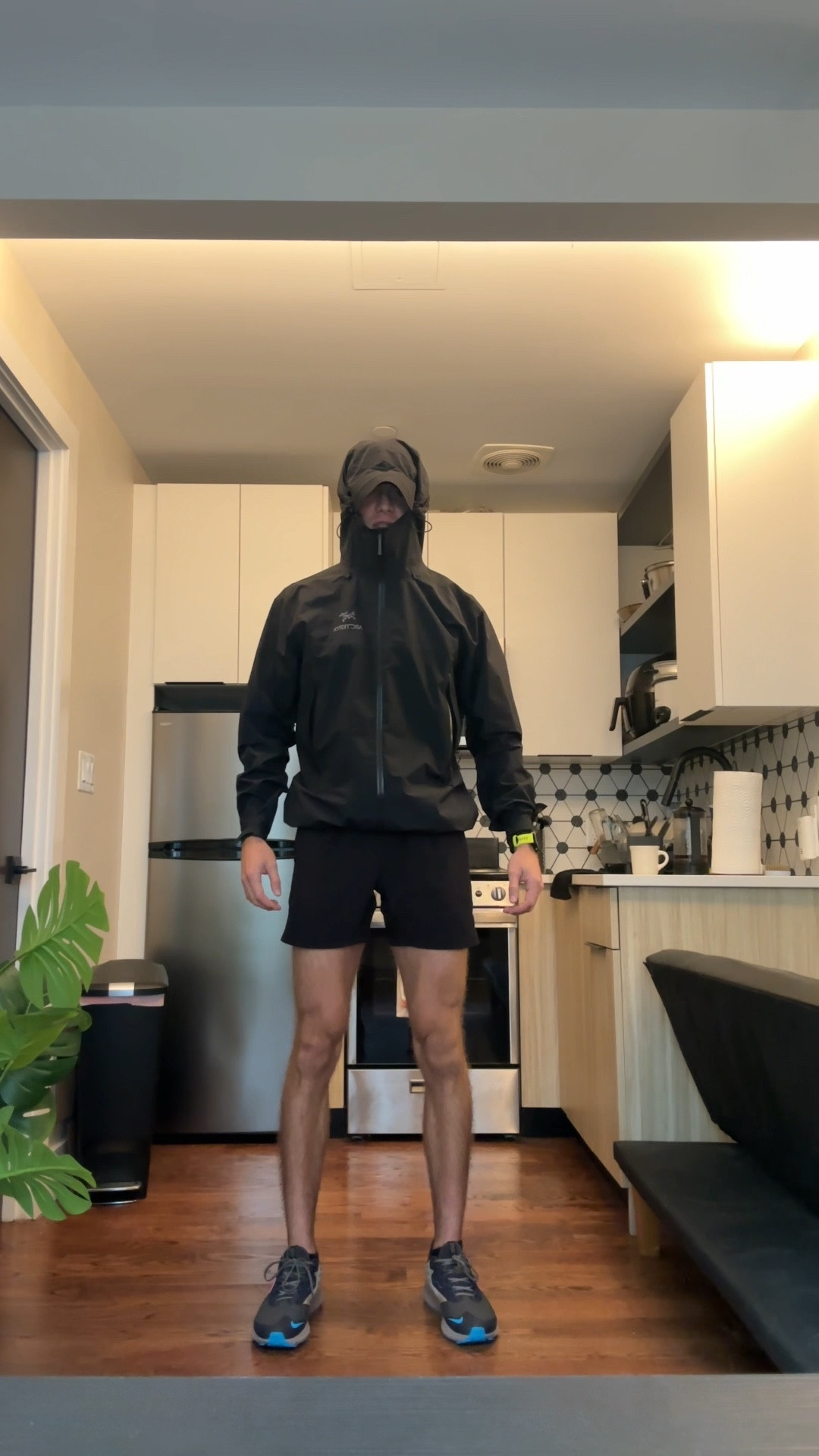 Getting geared up for a rainy run.

#LTKfitness #LTKmens #LTKshoecrush