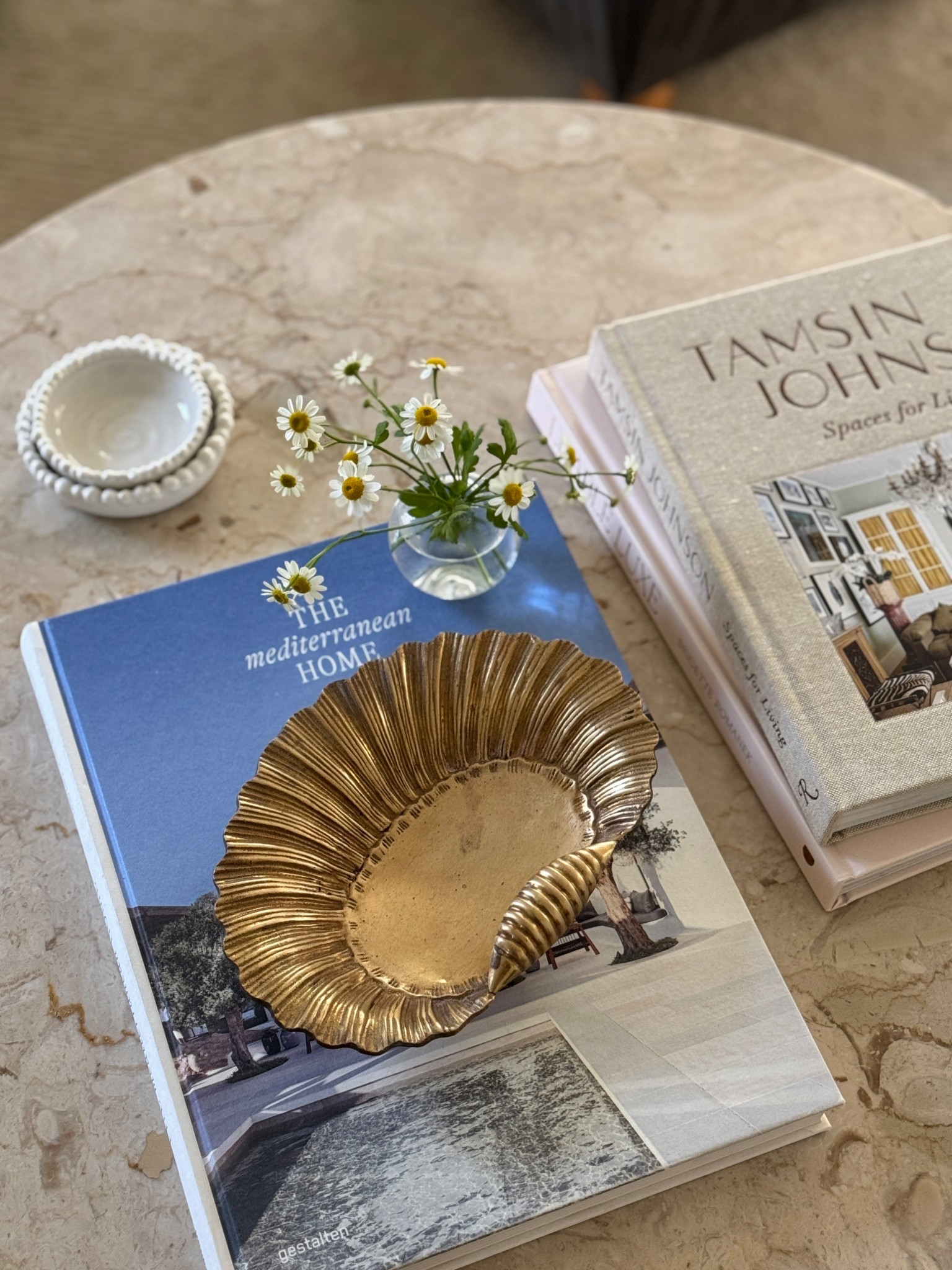 There is a beauty and ease that comes with life by the sea, whether it be on northern or southern shores. Seashells are a quintessential beauty that are worn by living creatures, eventually discarded for us to enjoy or broken down to become one with the earth. They’re a reminder of the beauty of life and how powerful nature can be. And because of that, I think they’re a perfect addition to any room – no matter where you live!

#LTKSeasonal #LTKStyleTip #LTKHome