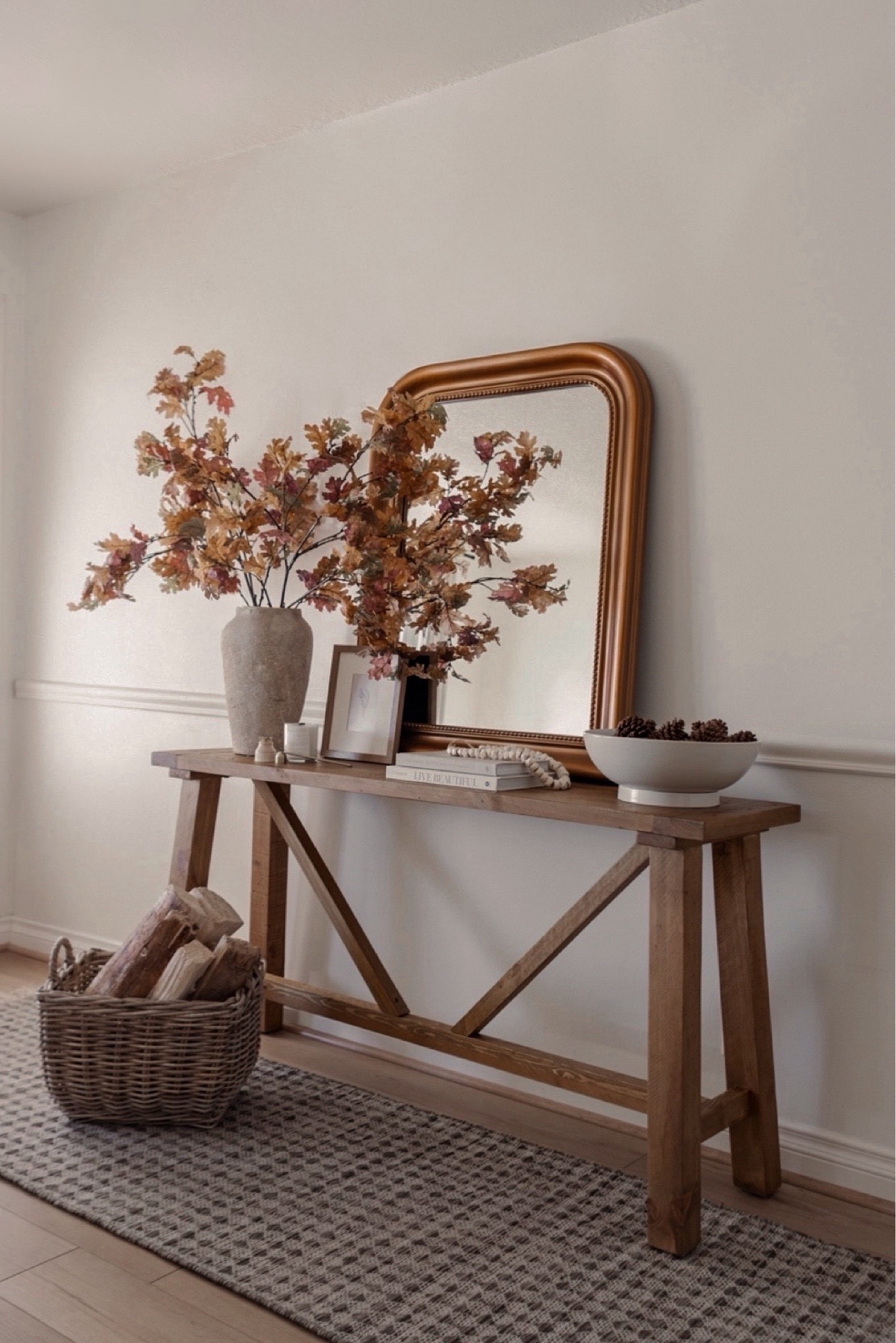 Shop this gorgeous fall entryway — including this affordable wood console table! 

#LTKHome #LTKSeasonal