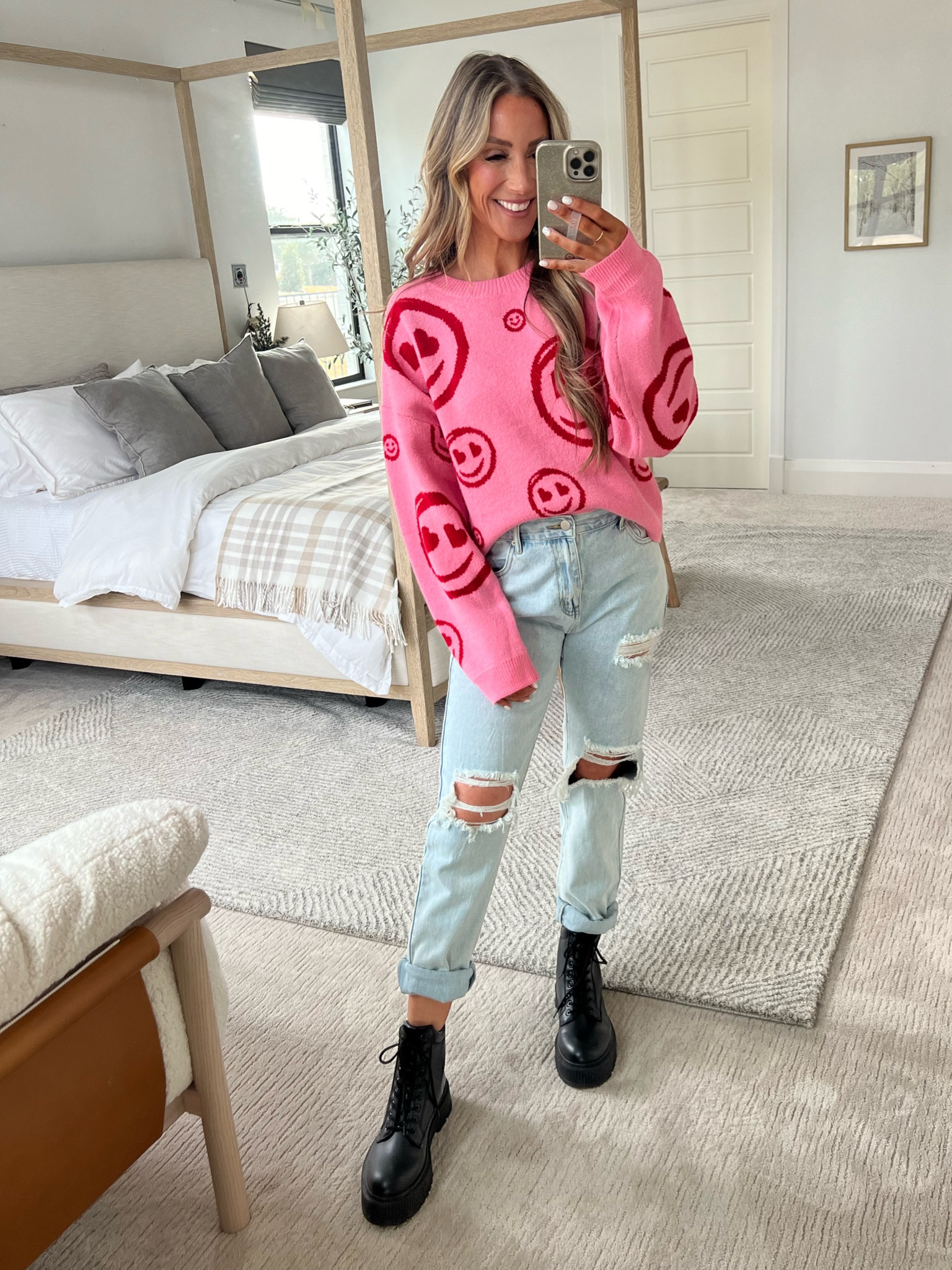 SARAHLIT to save smiley face heart, eyes sweater, Valentines outfit 

#LTKfindsunder50 #LTKSeasonal