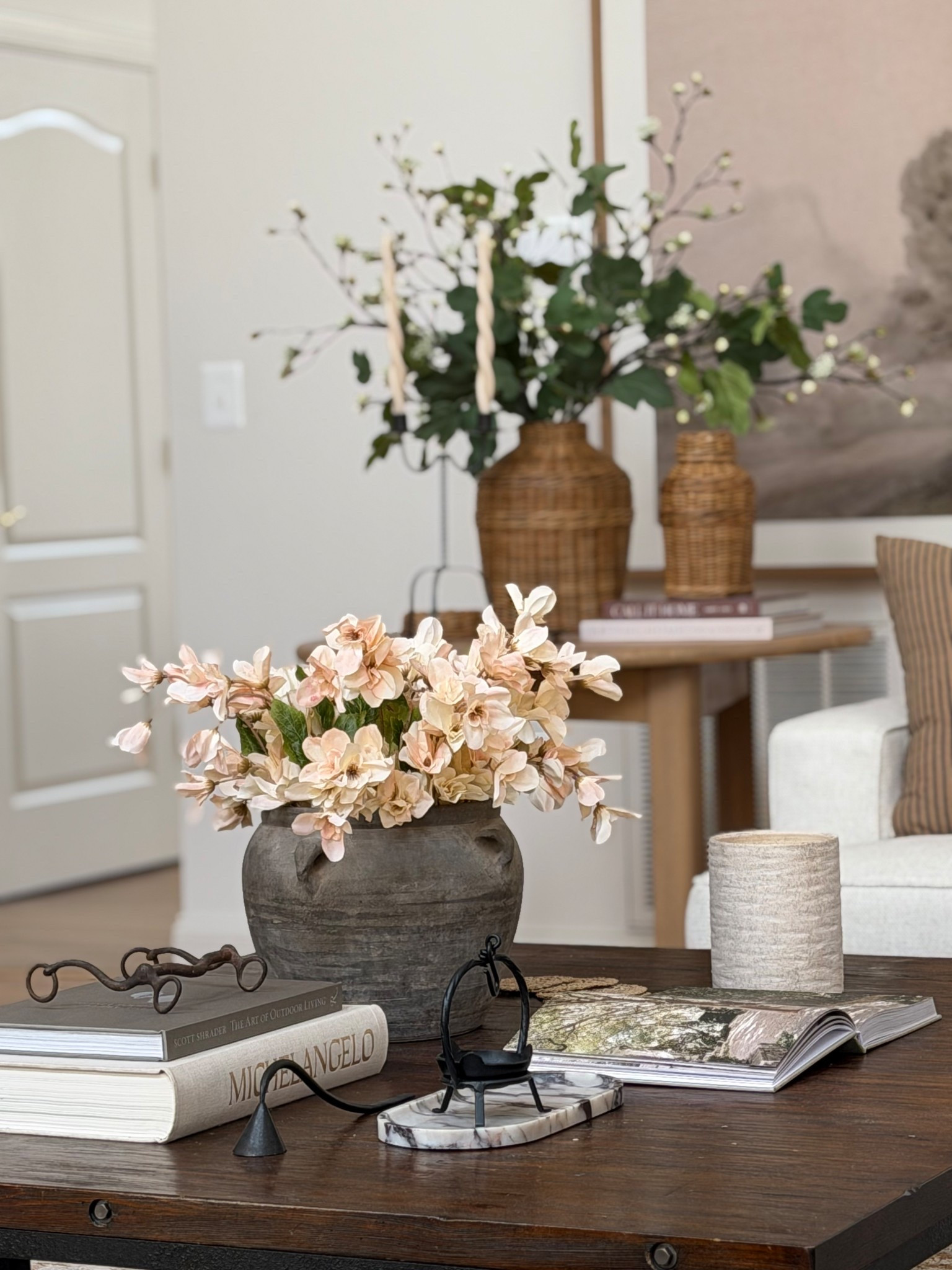 Spring coffee table. These stems come as a set of 6 but I clipped in half to double the amount and keep a low profile on our coffee table. Added a little blue to the petals for a blush tone. Such a steal for $25 

#LTKSpringSale #LTKSaleAlert #LTKHome