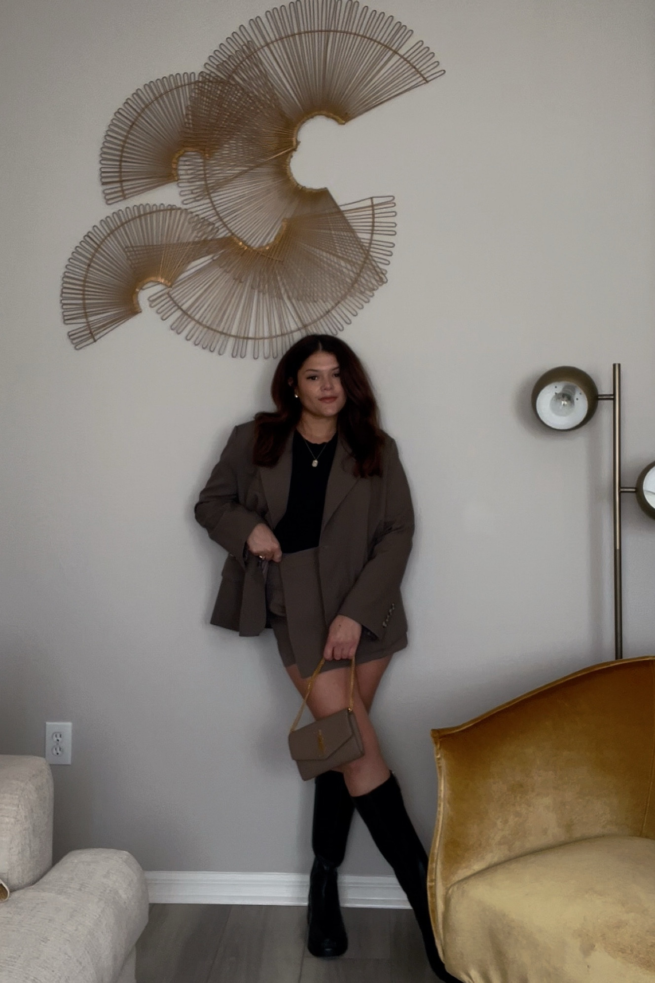 Skort/ chocolate blazer / basic black Tee/ black knee hight boots 

#LTKMidsize #LTKStyleTip #LTKSeasonal