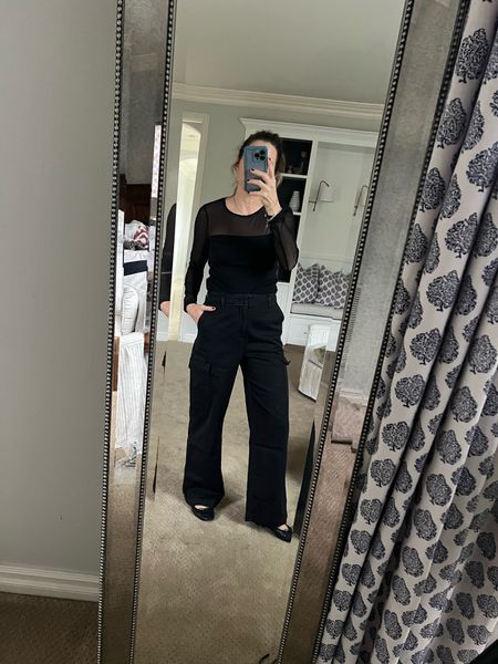 Same trousers, different vibes, allllll on sale. ✨🖤 Filming content, happy I found this top at the bottom of my closet, addressing the holiday cards and wondering what’s for dinner and who is cooking it, how about you??

Just found this mesh top in a mock turtleneck version. And don’t be fooled by the photo on the website, it is way more Lux in person. 