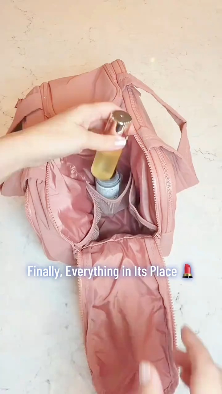 Shop this cute and practical pink travel toiletry bag that keeps your makeup, beauty essentials, and toiletries perfectly organized for trips, the gym, or everyday use. #LTKTravel #LTKBeauty #LTKHome #LTKSaleAlert 

 