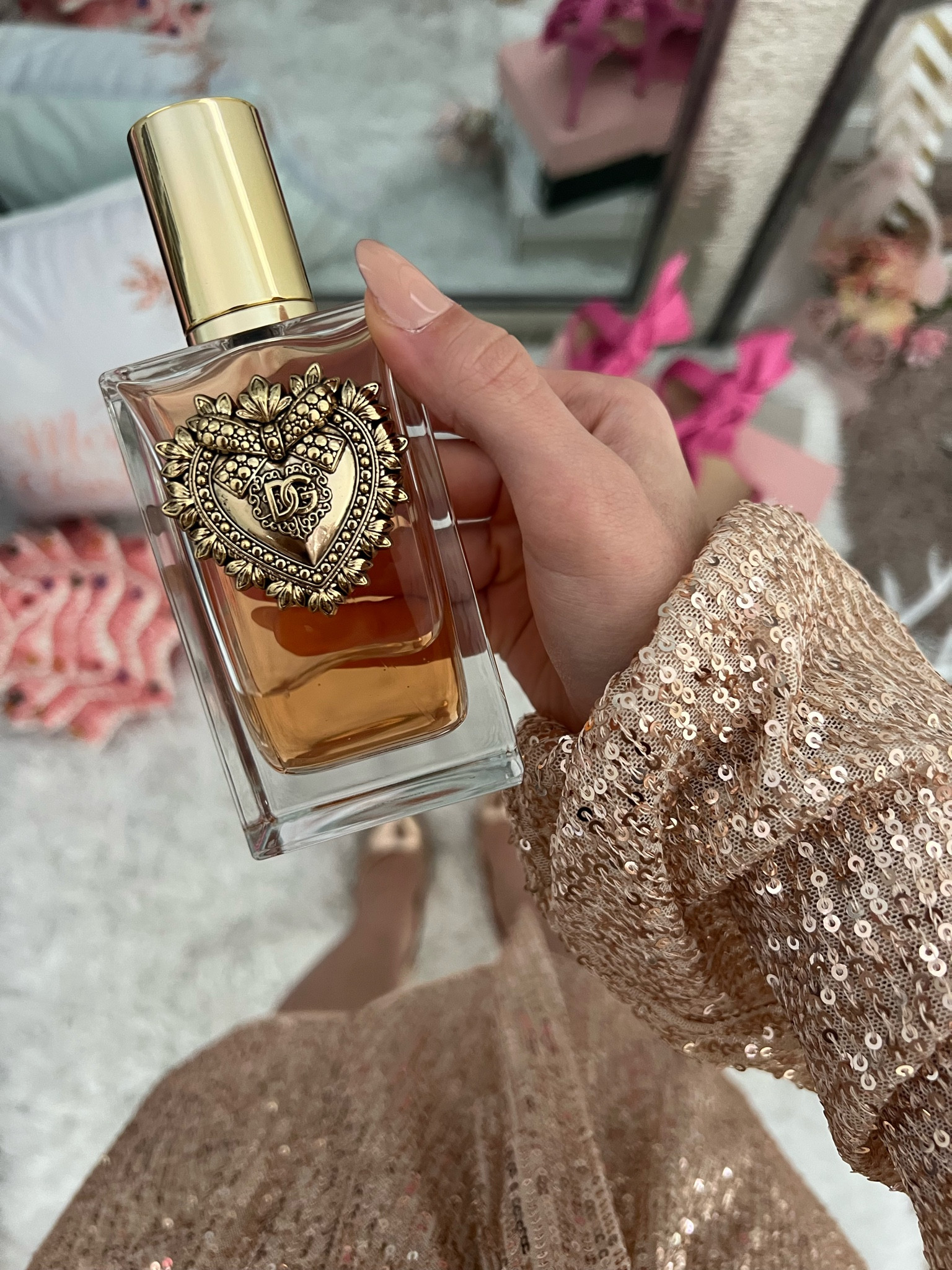Devotion Eau De Parfume from Dolce and Gabbana! Also linking a similar sequin dress for new years (new years outfit inspo). Xoxo

Fragrance Family: Floral
Scent Type: Warm Floral
Key Notes: Candied Citrus, Orange Blossom, Vanilla
Fragrance Description: This eau de parfum contains top notes of tantalizing and candied citrus, a heart note of orange blossom, and a base note of alluring vanilla.

#LTKHoliday #LTKGiftGuide #LTKbeauty