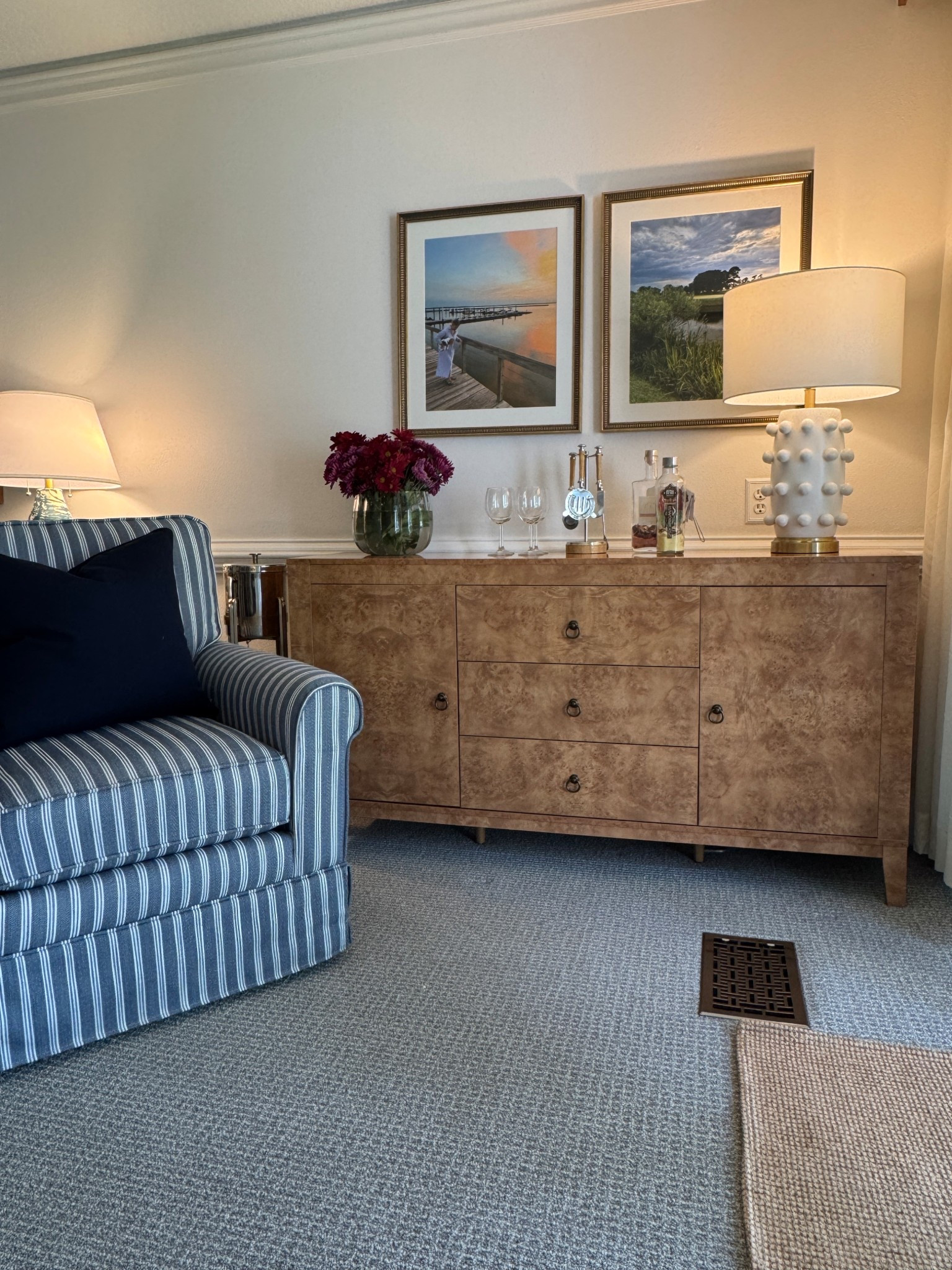 Our condo got a little Fall upgrade with this burl wood–style console. It’s perfect for stashing board games, extra blankets, and even pickleball paddles for our guests. On top, I added barware accessories, and paired with my Wayfair swivel chairs and lamp, the whole space feels cozy and complete. Now’s a great time to shop Wayfair during their Epic Fall Sale, with Up to 70% Off! Fast & Easy Delivery on orders over $35. I’ve linked these Wayfair finds and more picks from the sale! @wayfair #Wayfair #wayfairpartner  

#LTKSaleAlert #LTKHome