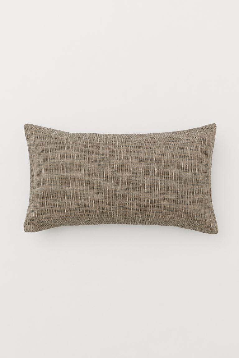 Conscious choice  For the love of craftCushion cover in handwoven fabric made from jute and plant... | H&M (US)