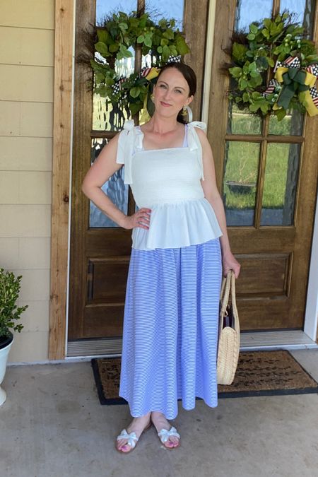 Blue and white, spring outfit, blue maxi, white peplum top, wicker handbag, white slides, white leather sandals, easter outfit, feminine style, nap dress style, regency style, modest but classy 

#LTKunder50 #LTKFind #LTKSeasonal