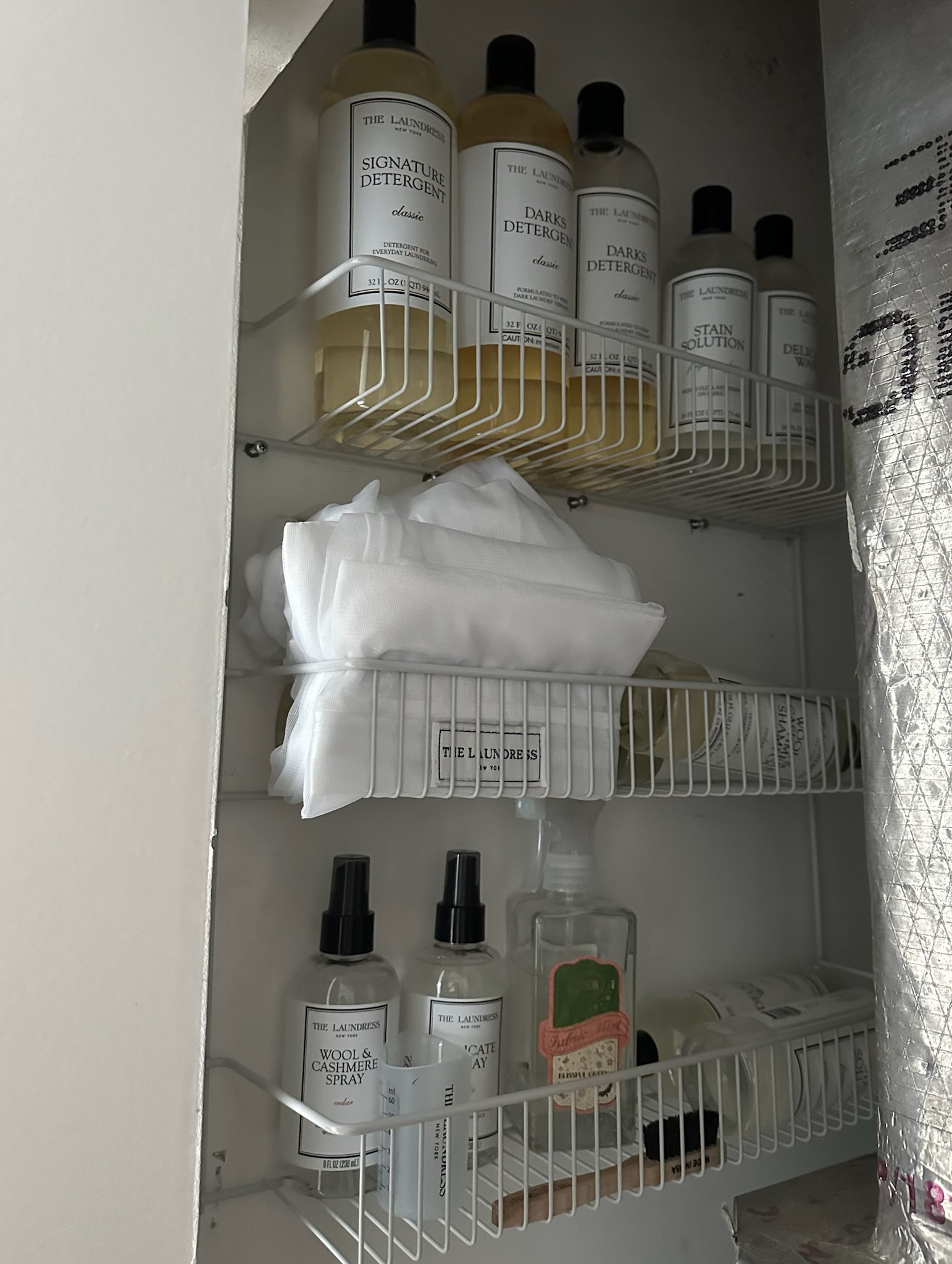 Added a tiered rack with all of our laundry products to save space! 

#LTKHome