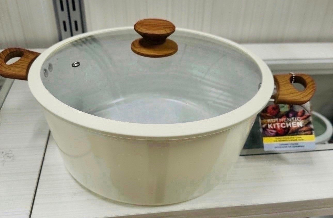 Elevated kitchen essentials on a budget. 👩‍🍳 This cream ceramic stock pot with the wood-effect handles is the perfect blend of functional and aesthetic. It looks so high-end sitting on the stove! Neutral lovers, this one is for you. #KitchenFinds #HomeDecor #NeutralAesthetic
