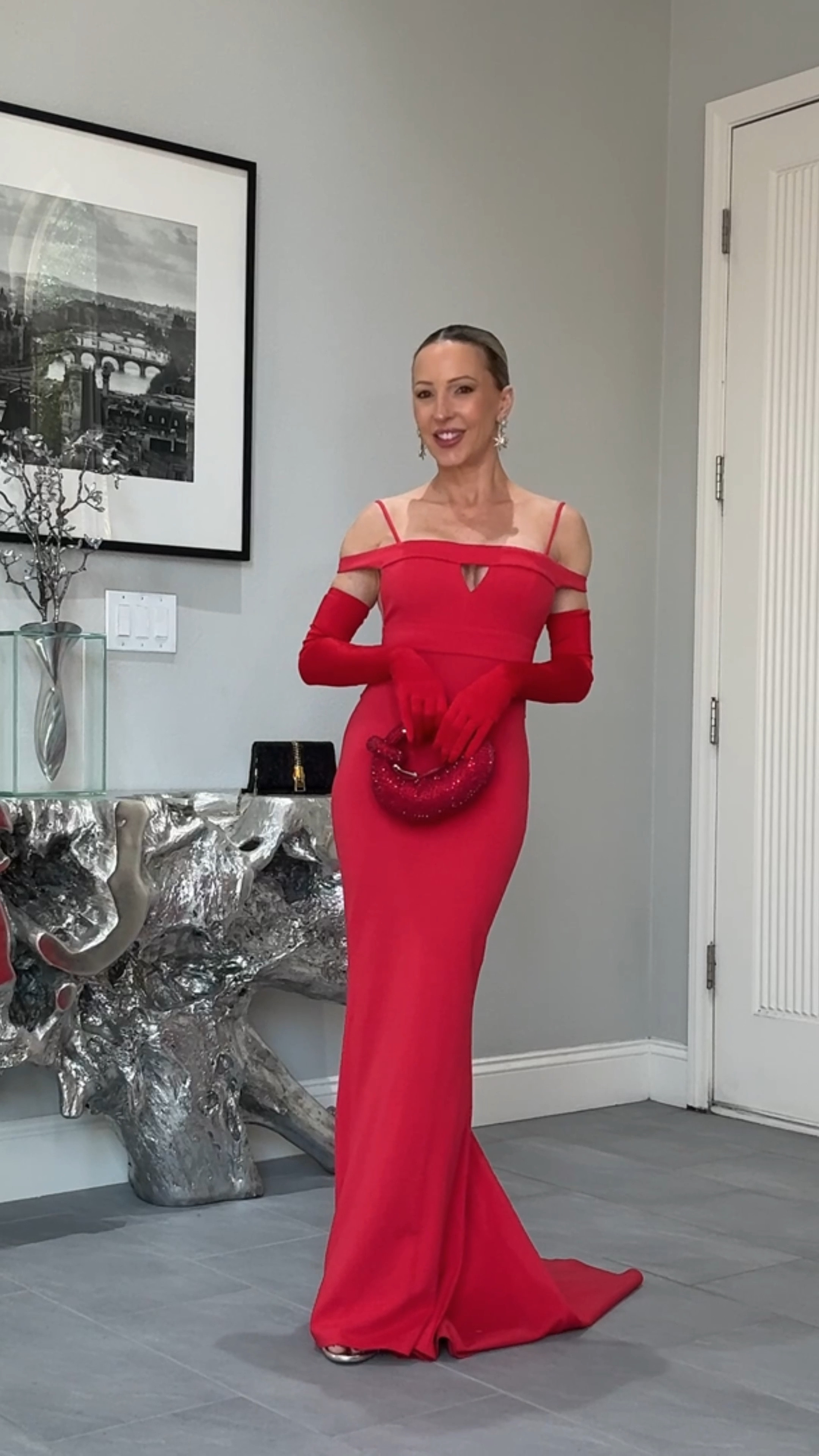 Holiday party dress, Christmas party dress, holiday outfit, black tie dress, gala dress, red off the shoulder gown wit train (styled with gold strappy heel sandals, red satin evening gloves, red crystal bag and red evening gloves). 

#LTKWatchNow #LTKHoliday #LTKParties