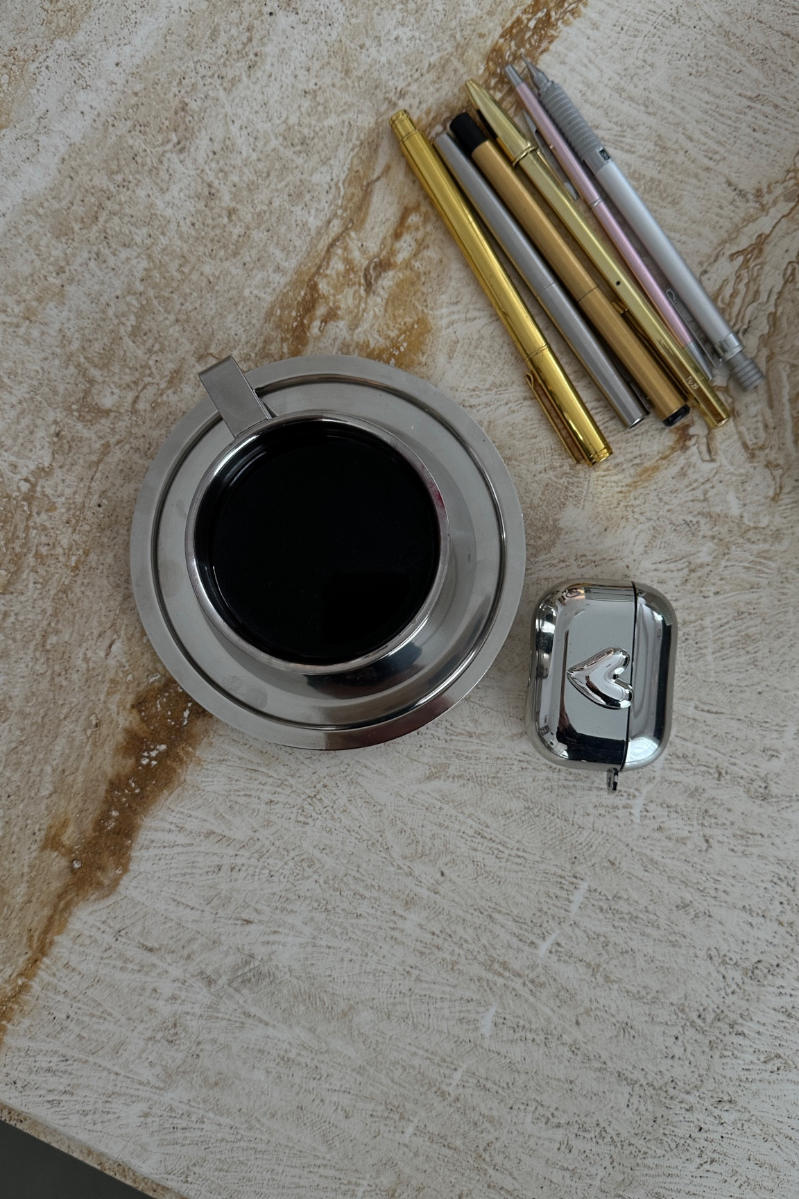 Writing necessities 🩶🩶
Working from home | Silver cup and saucer | Gold pens | Silver pens | Stationery | Heart AirPods case | Mechanical pencil 

#LTKhome #LTKeurope #LTKuk